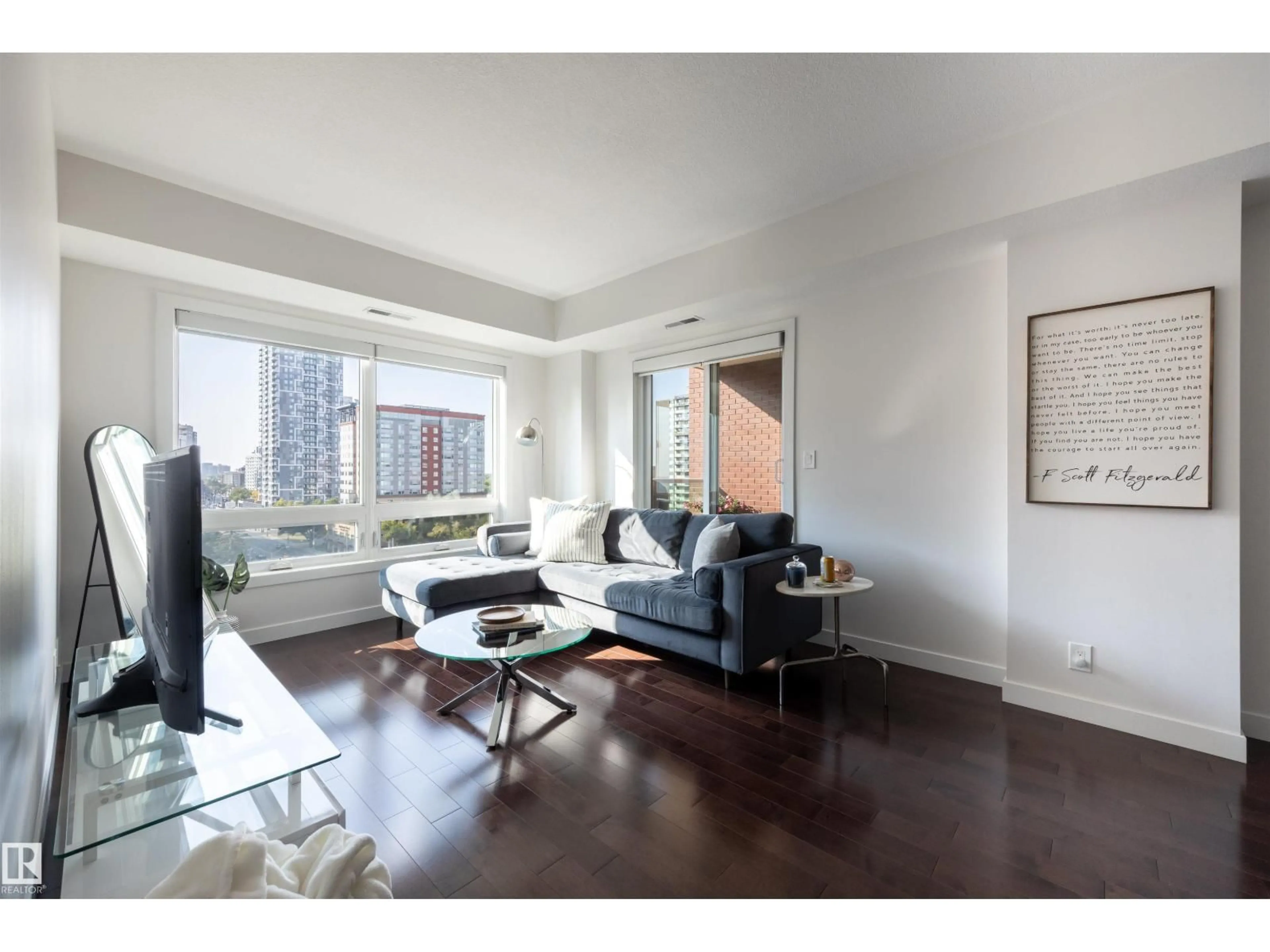 Living room with furniture, wood/laminate floor for 905 - 10055 118 ST, Edmonton Alberta T5K0C1