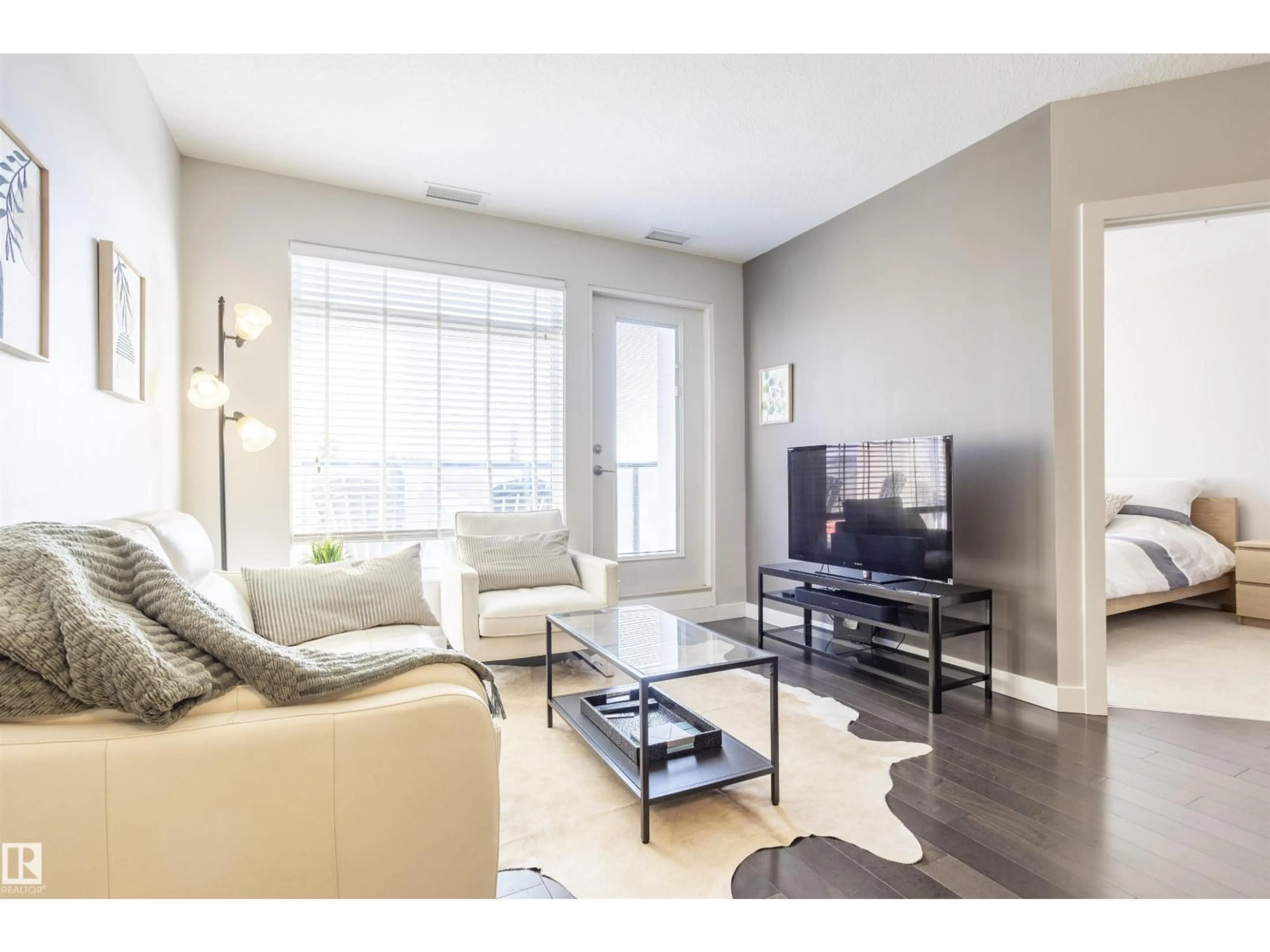 Living room with furniture, unknown for #307 - 5151 WINDERMERE BV, Edmonton Alberta T6W2K4