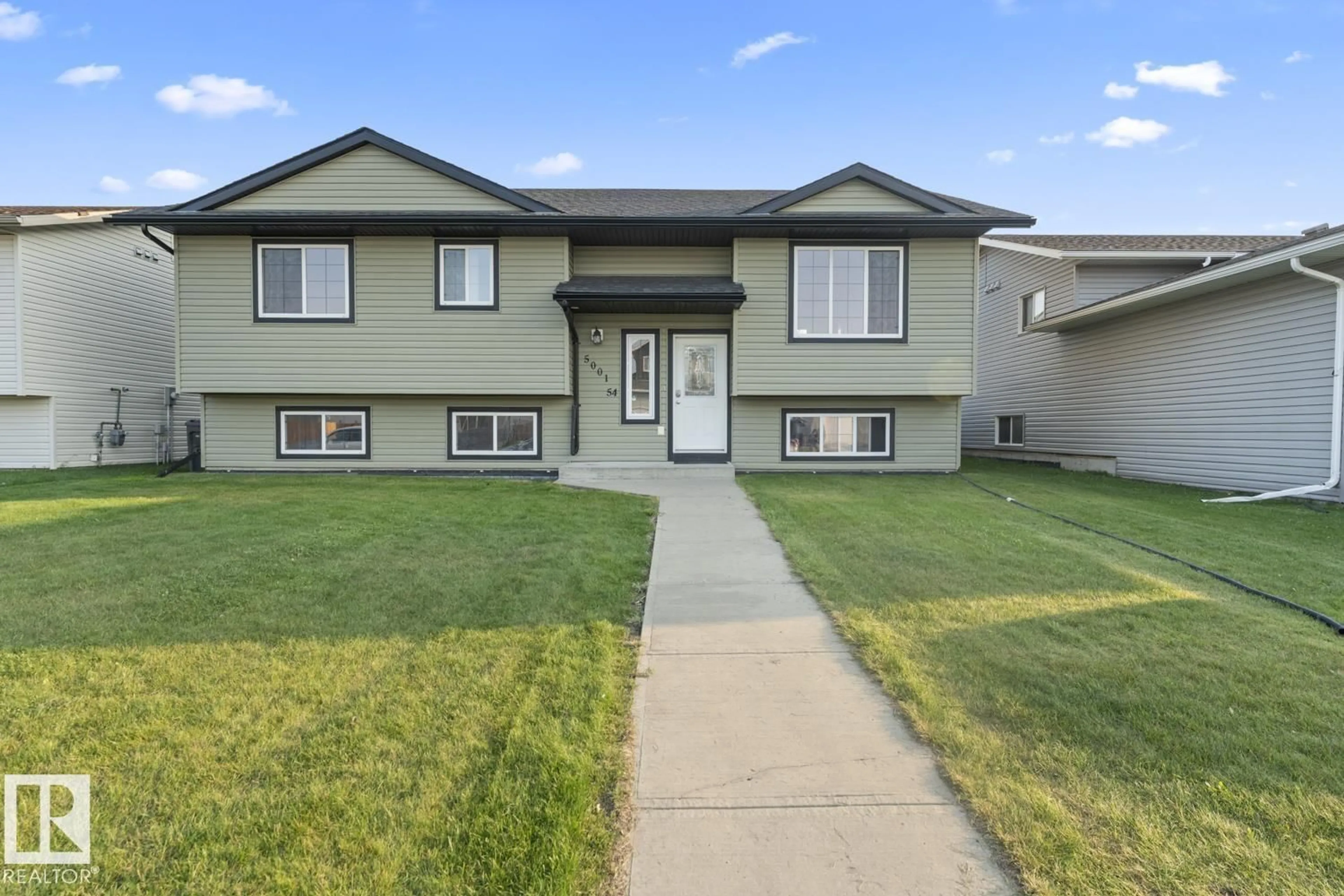 Home with vinyl exterior material, street for 5001 54 AV, Cold Lake Alberta T9M0B4