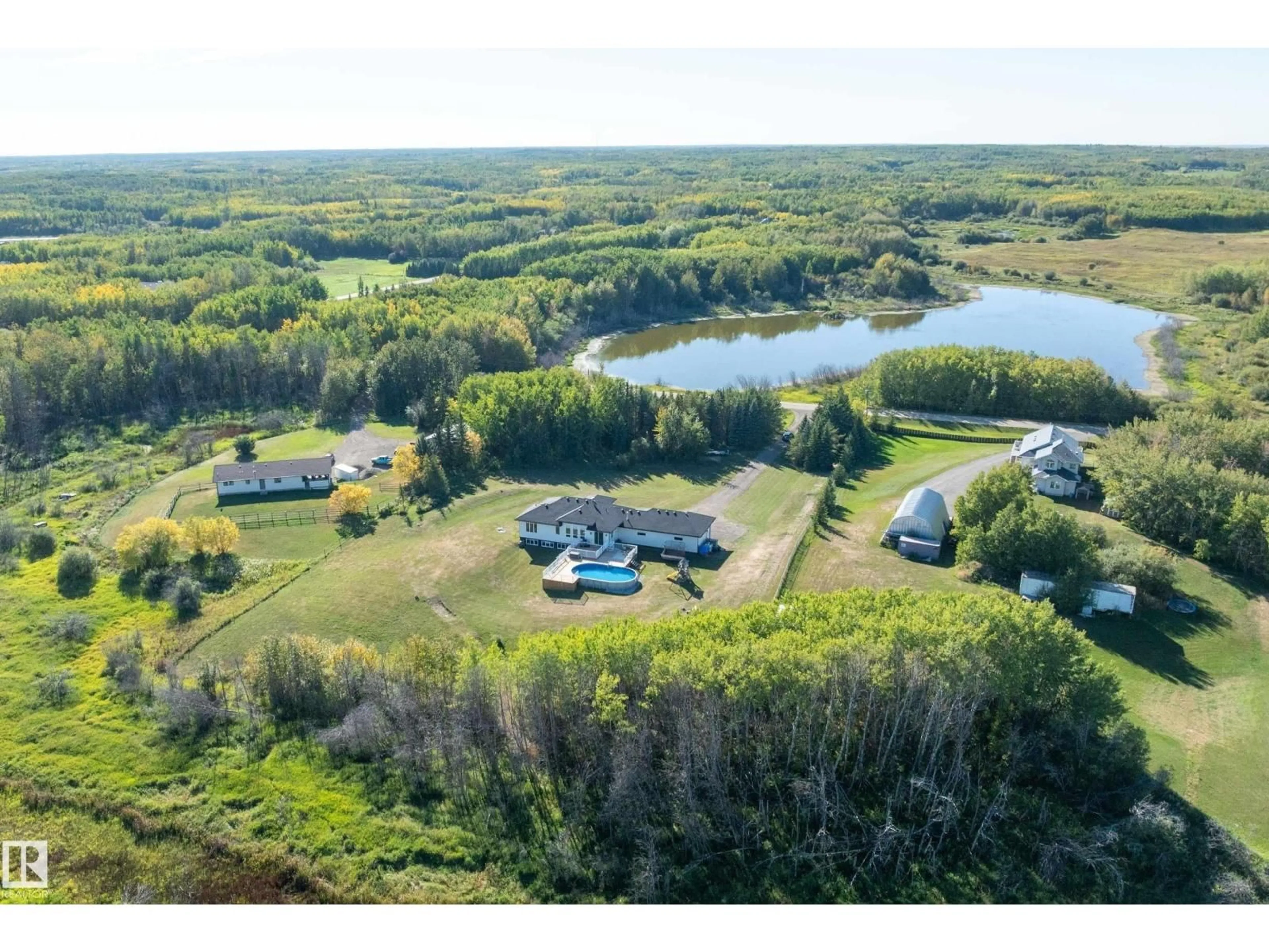 A pic from outside/outdoor area/front of a property/back of a property/a pic from drone, water/lake/river/ocean view for 181 20212 TOWNSHIP ROAD ROAD, Rural Strathcona County Alberta T8G1E4