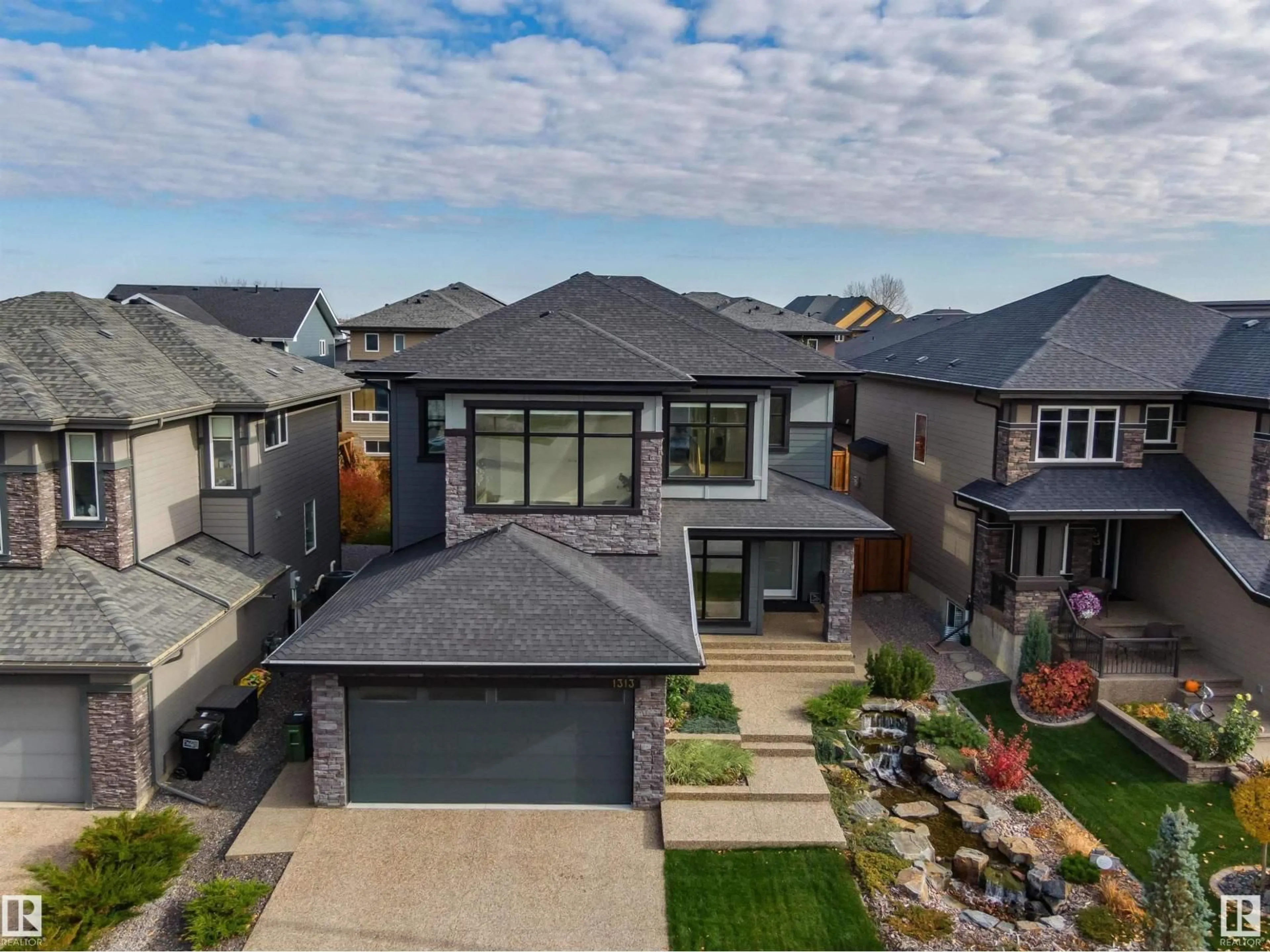 A pic from outside/outdoor area/front of a property/back of a property/a pic from drone, street for 1313 HAINSTOCK WY, Edmonton Alberta T6W3B6