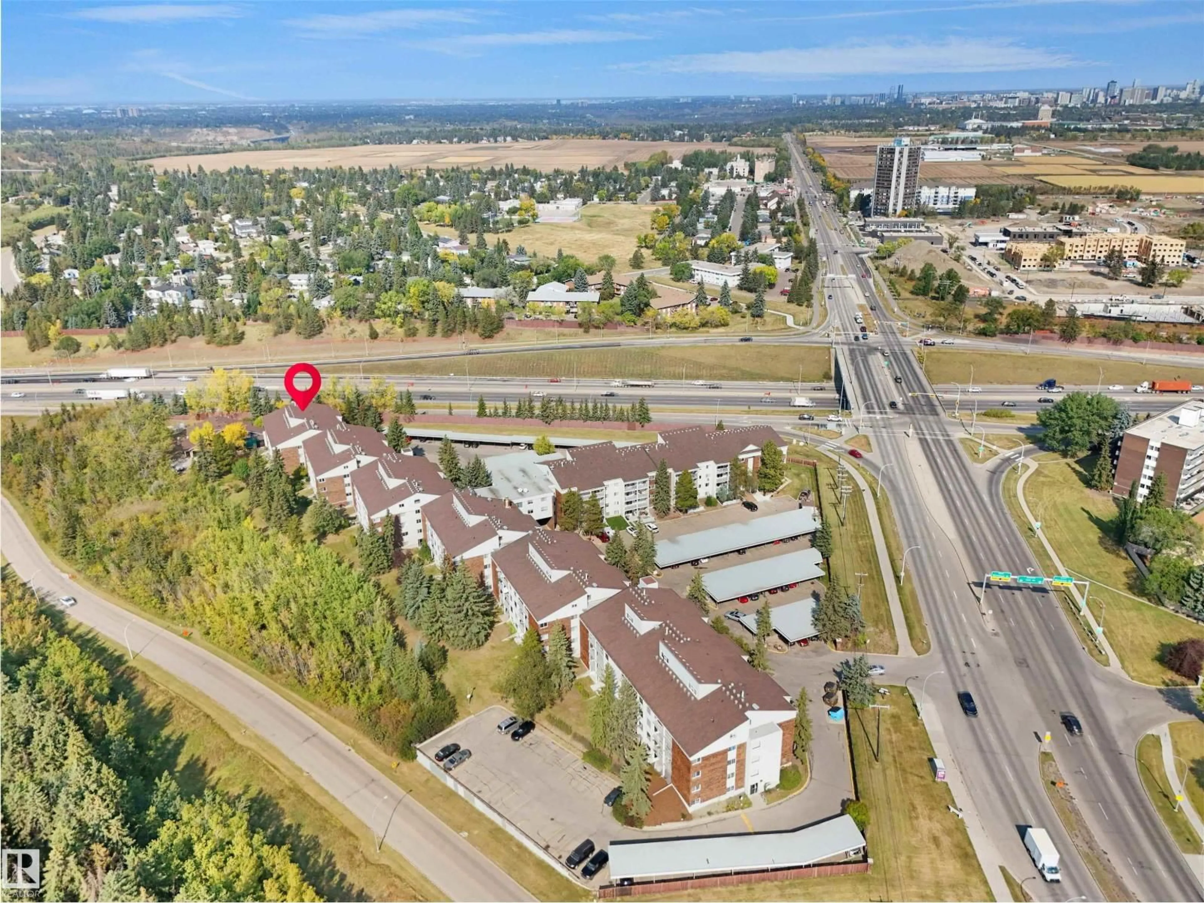 A pic from outside/outdoor area/front of a property/back of a property/a pic from drone, street for #102 - 4404 122 ST, Edmonton Alberta T6J4A9