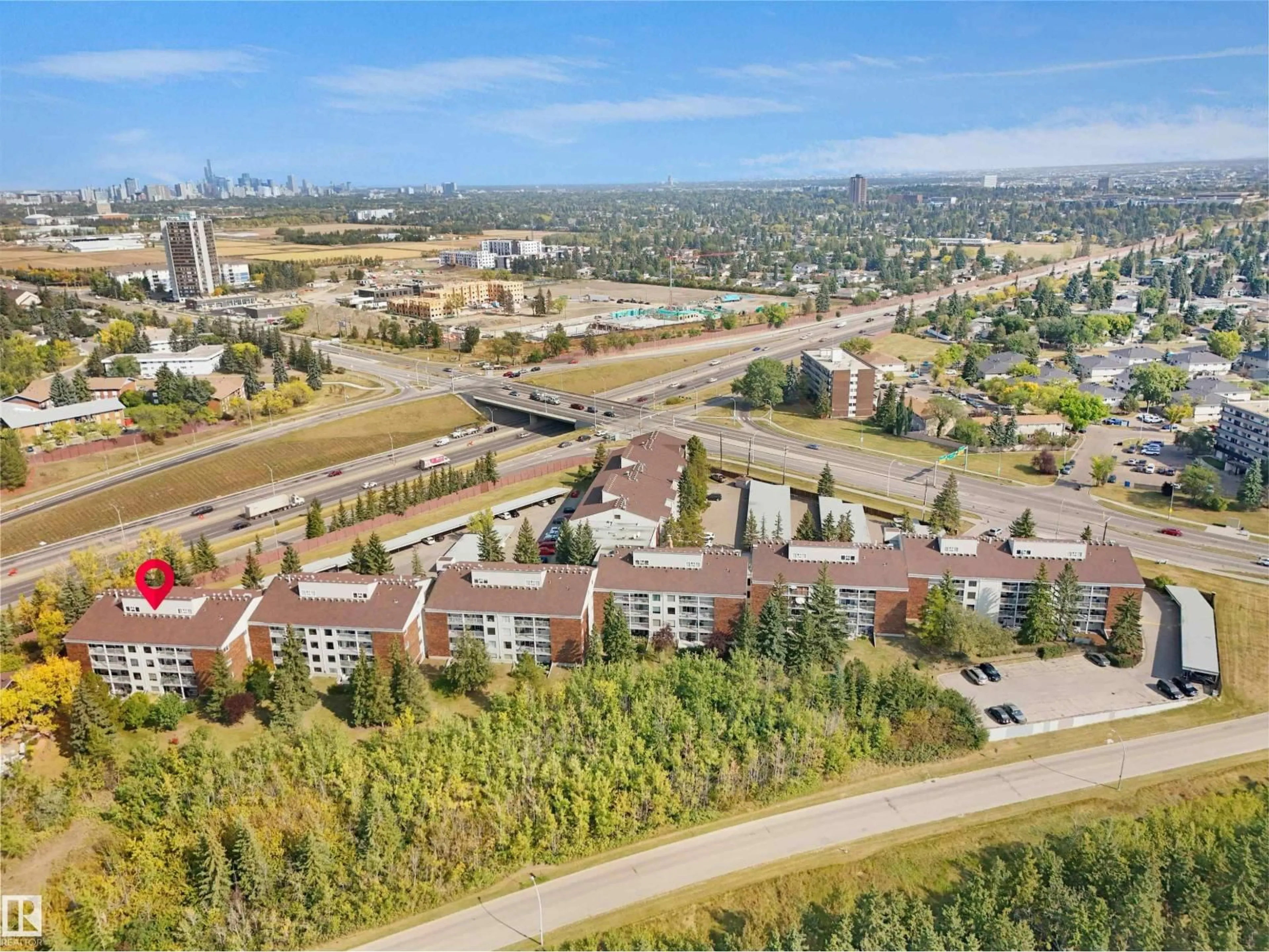A pic from outside/outdoor area/front of a property/back of a property/a pic from drone, unknown for #102 - 4404 122 ST, Edmonton Alberta T6J4A9