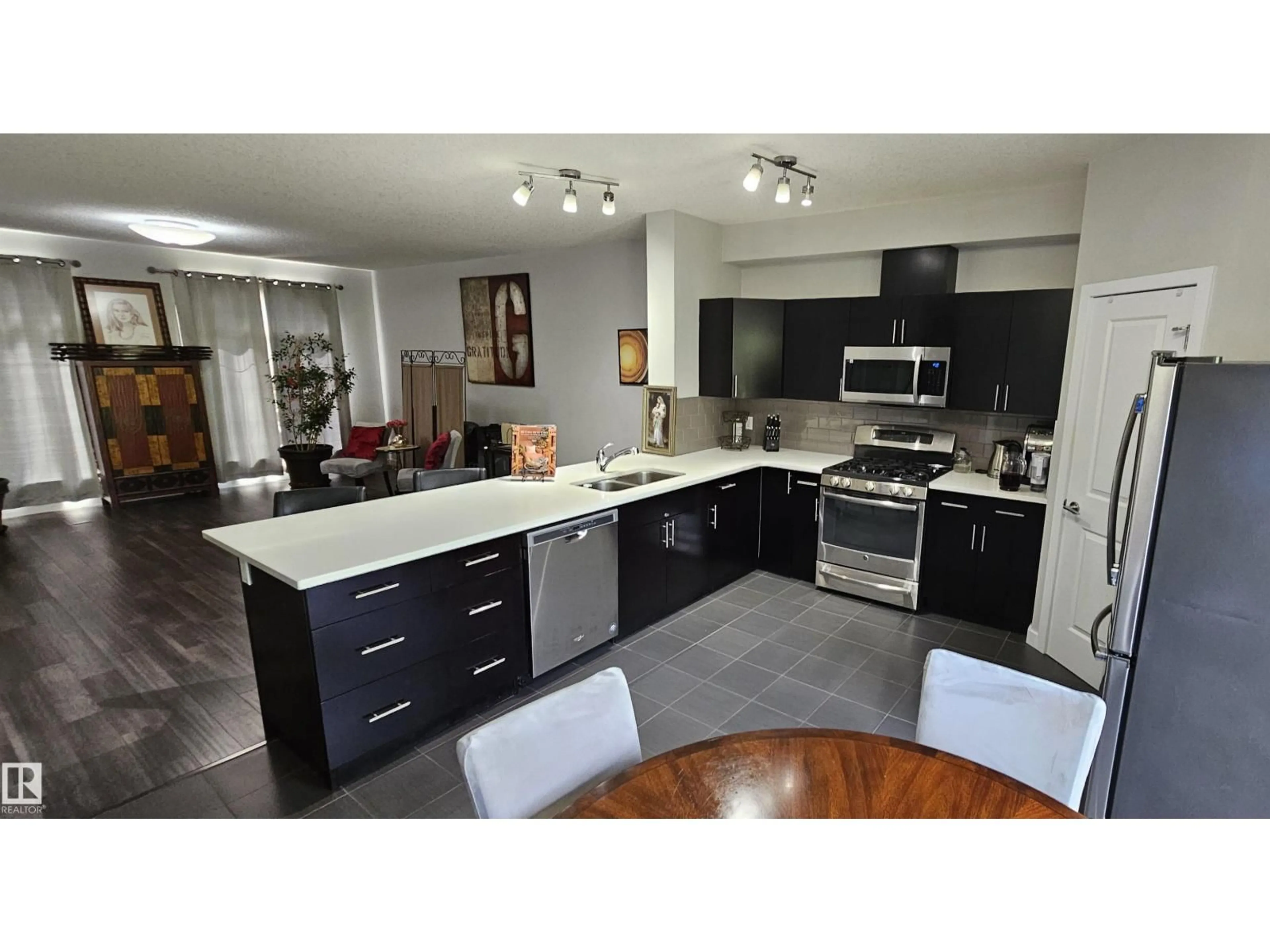 Open concept kitchen, unknown for 22 5873 MULLEN PL, Edmonton Alberta T6R0T5
