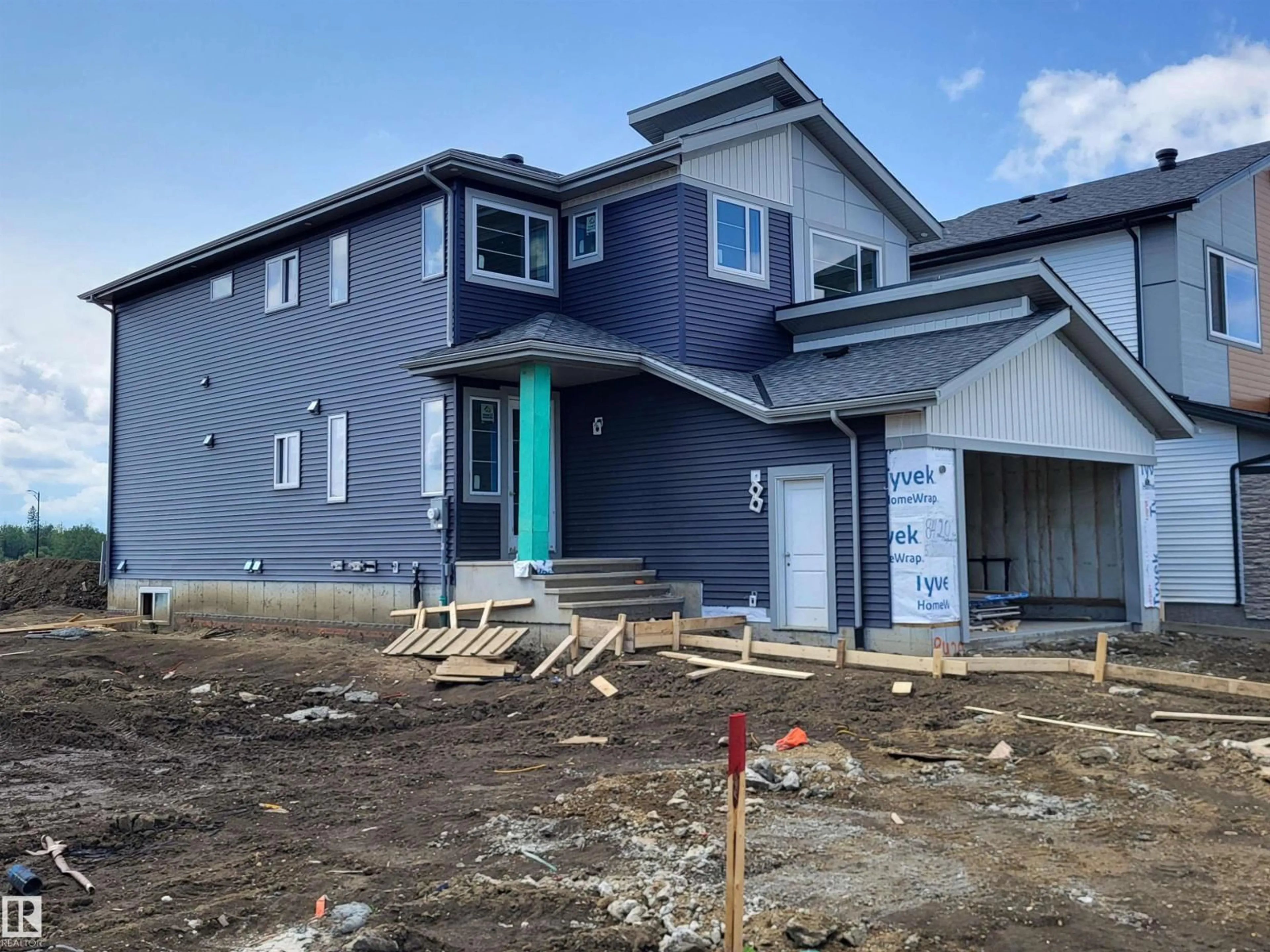 Home with vinyl exterior material, building for 8420 MAYDAY LINK, Edmonton Alberta T6X3G1