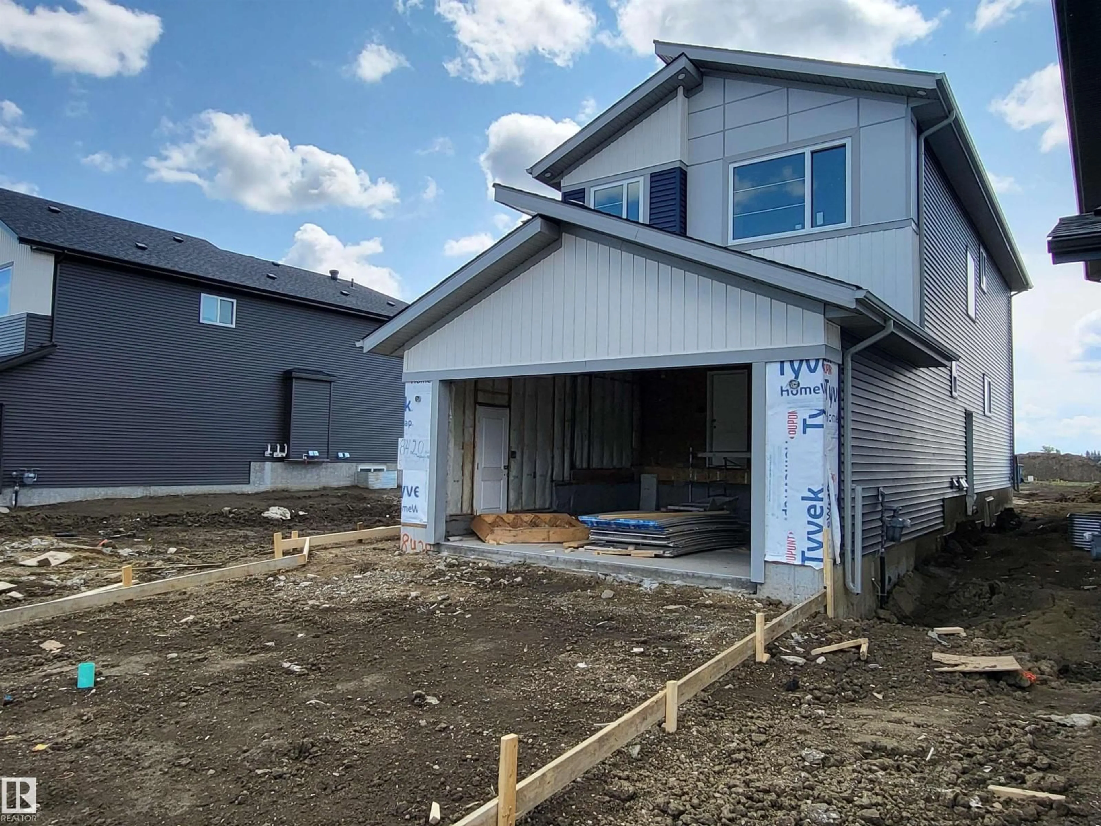 Home with vinyl exterior material, building for 8420 MAYDAY LINK, Edmonton Alberta T6X3G1