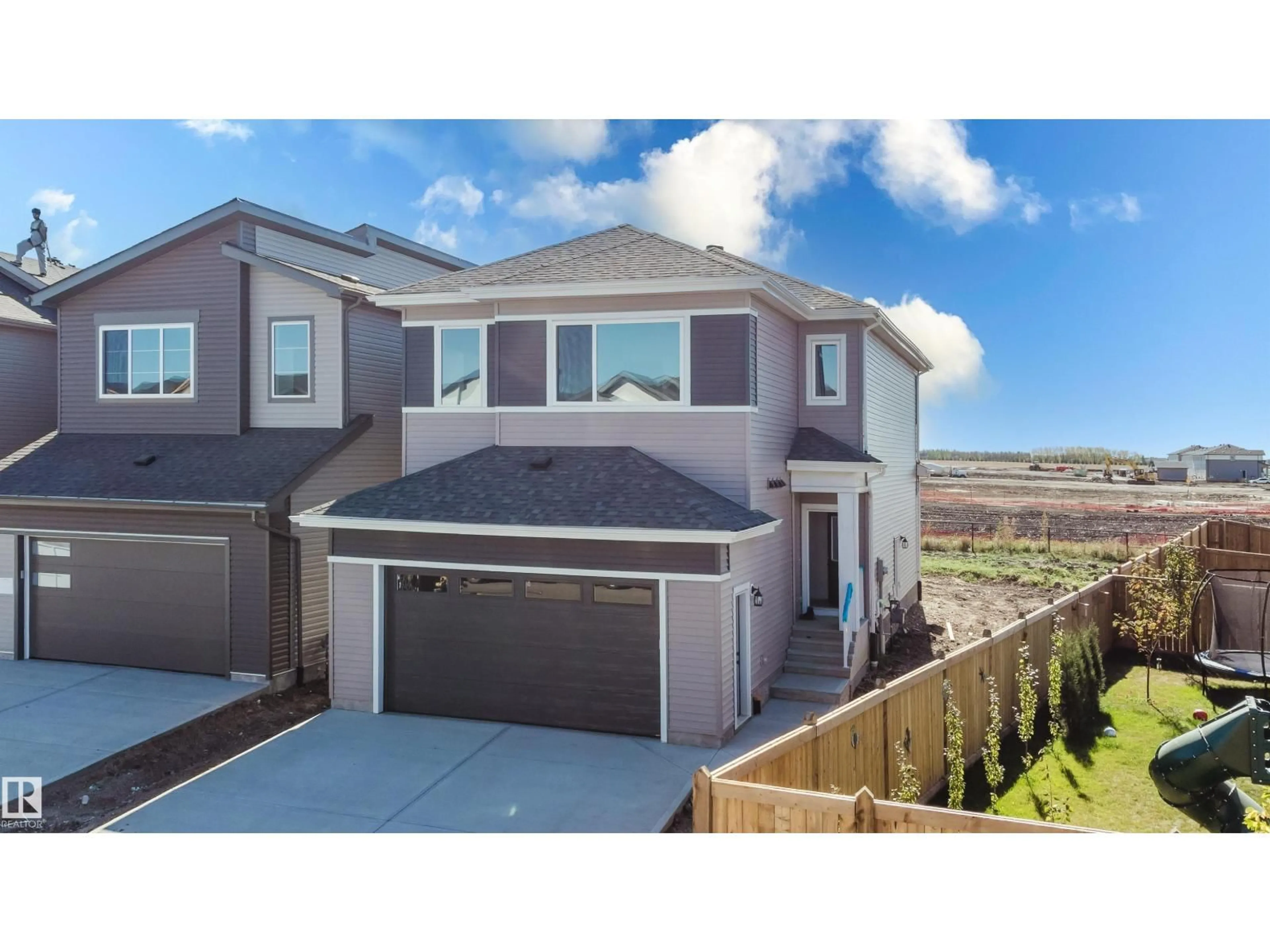 A pic from outside/outdoor area/front of a property/back of a property/a pic from drone, unknown for 373 BLUFF CV, Leduc Alberta T9E1M9