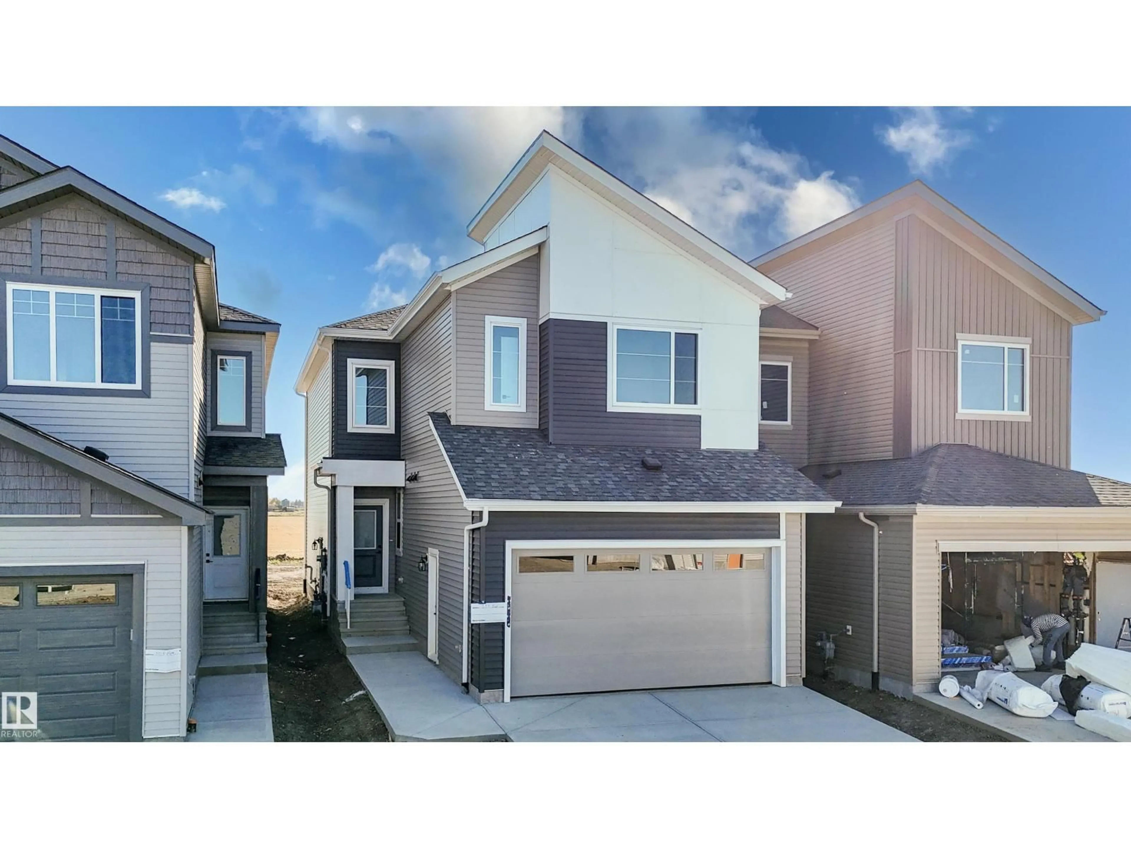 Home with vinyl exterior material, street for 333 BLUFF CV, Leduc Alberta T9E1S2
