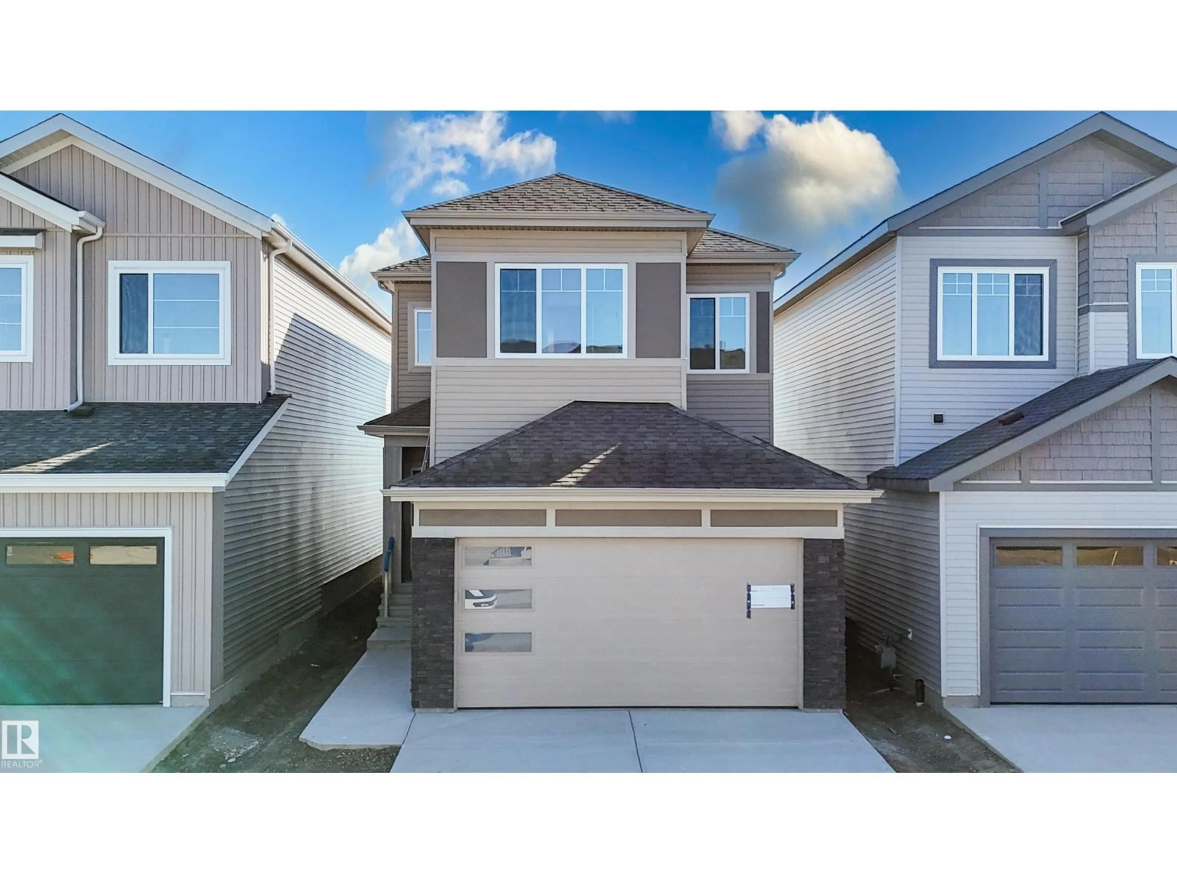 Home with vinyl exterior material, street for 329 BLUFF CV, Leduc Alberta T9E1R5
