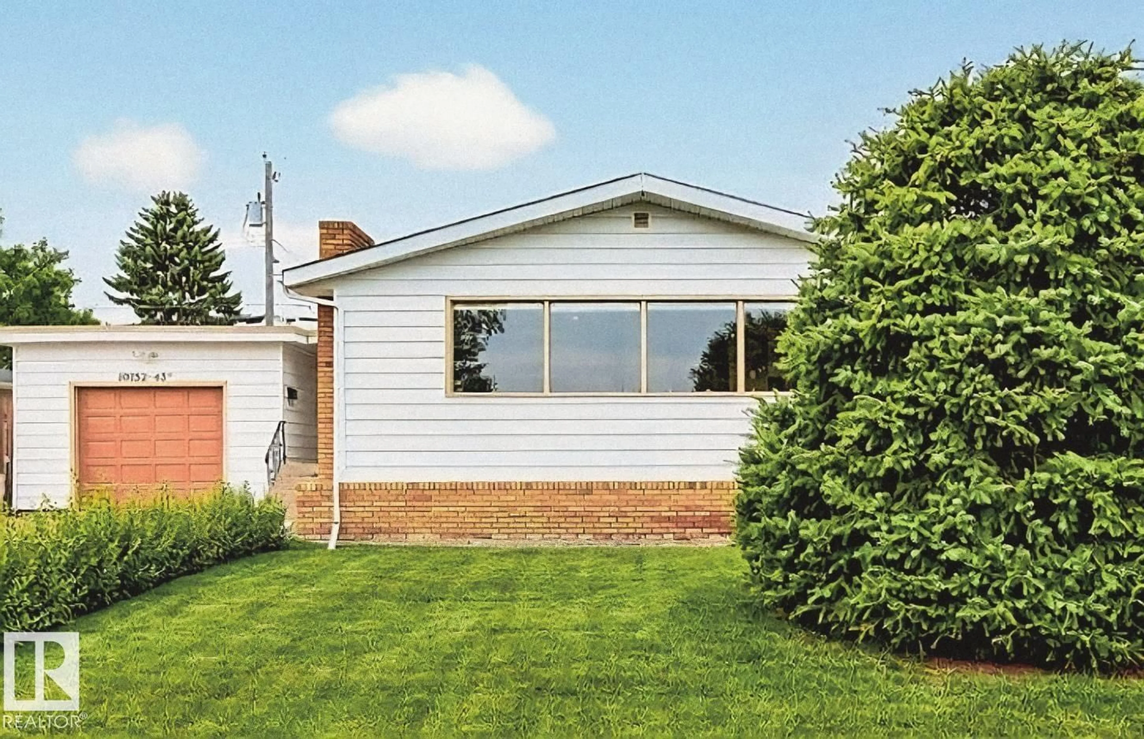 Home with vinyl exterior material, street for 10752 43 ST, Edmonton Alberta T6A1V4