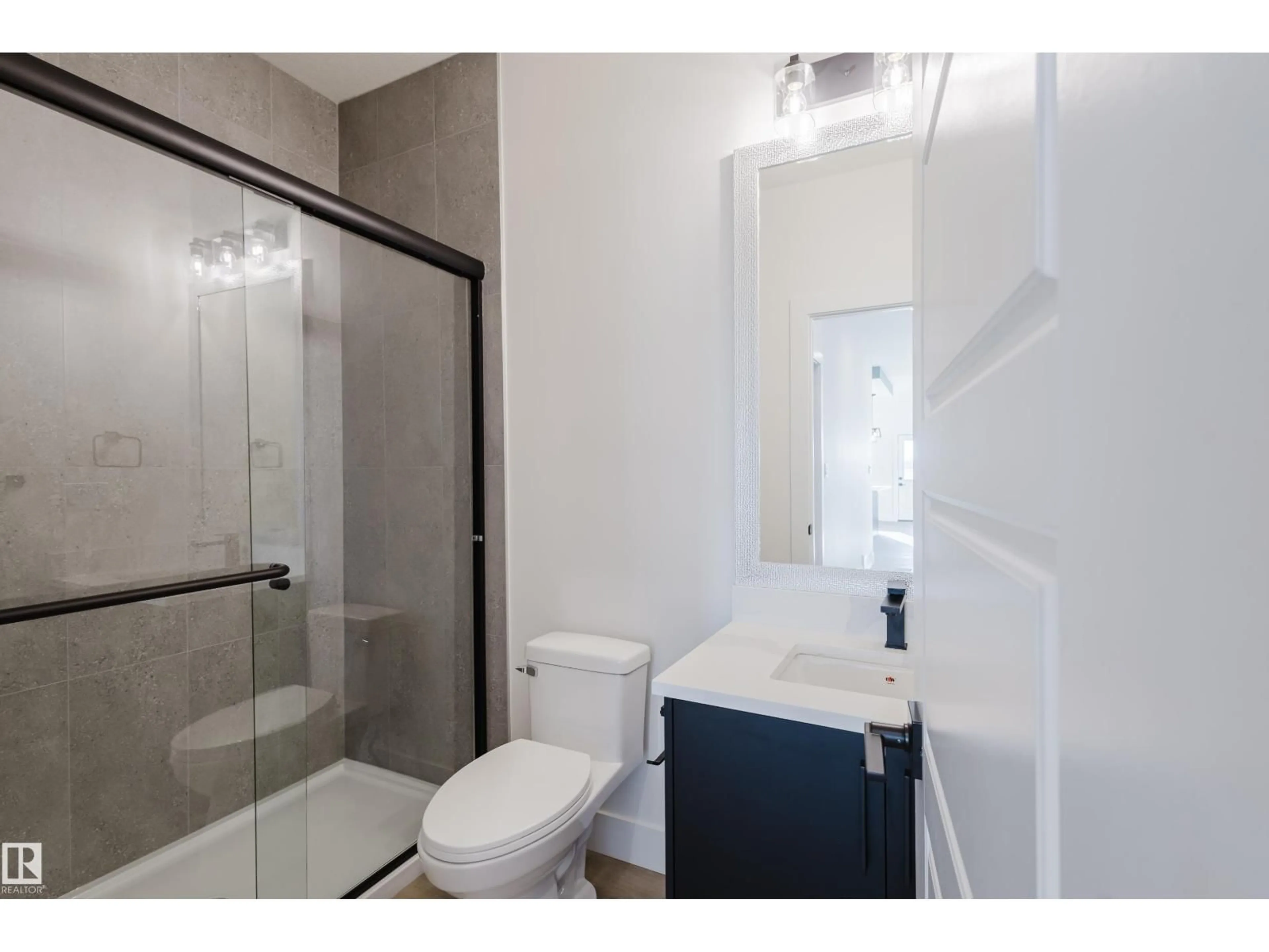 Standard bathroom, ceramic/tile floor for 327 BLUFF CV, Leduc Alberta T9E1R5