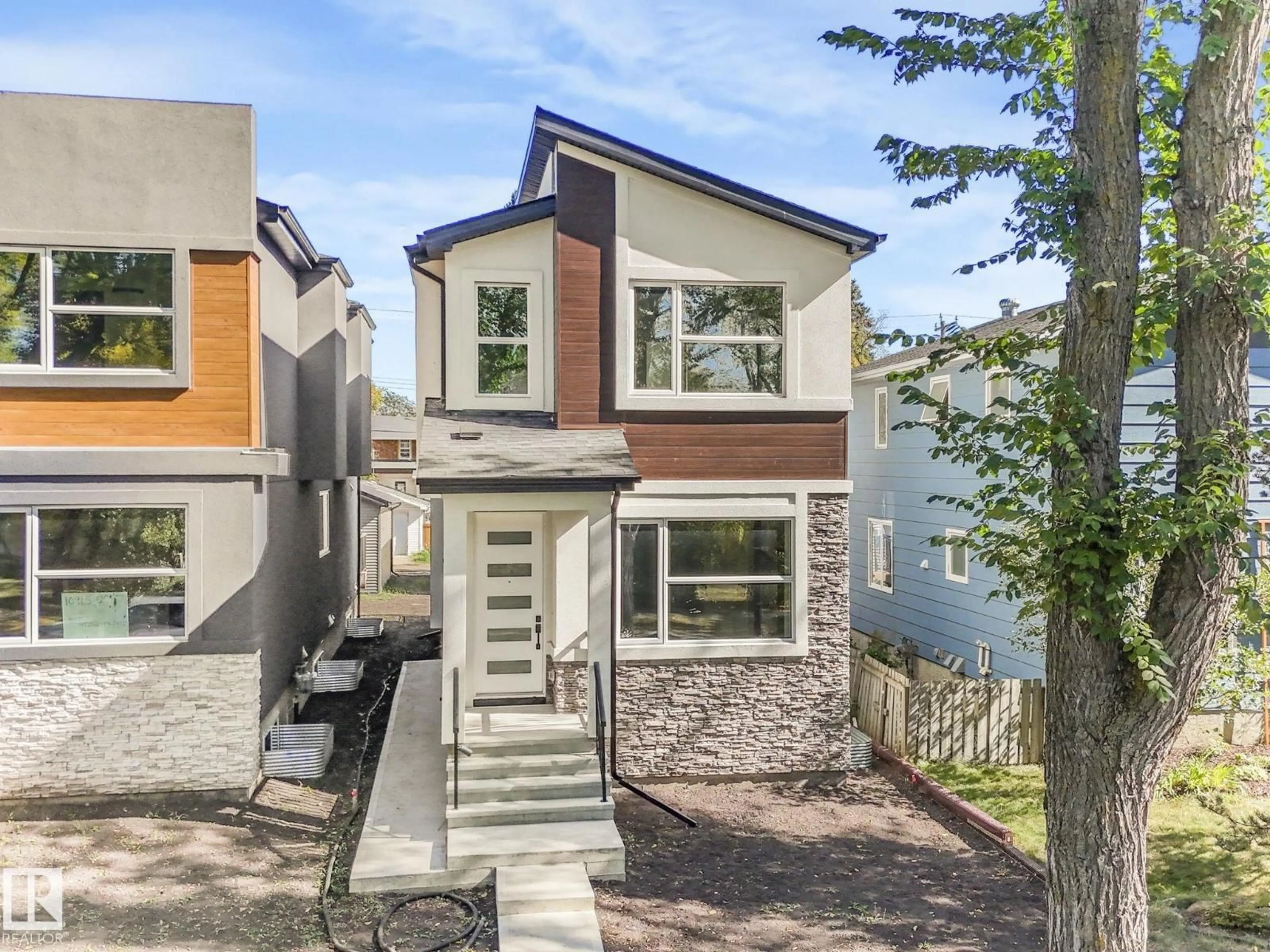 Home with brick exterior material, street for NW - 10963 129 ST, Edmonton Alberta T5M0Y2