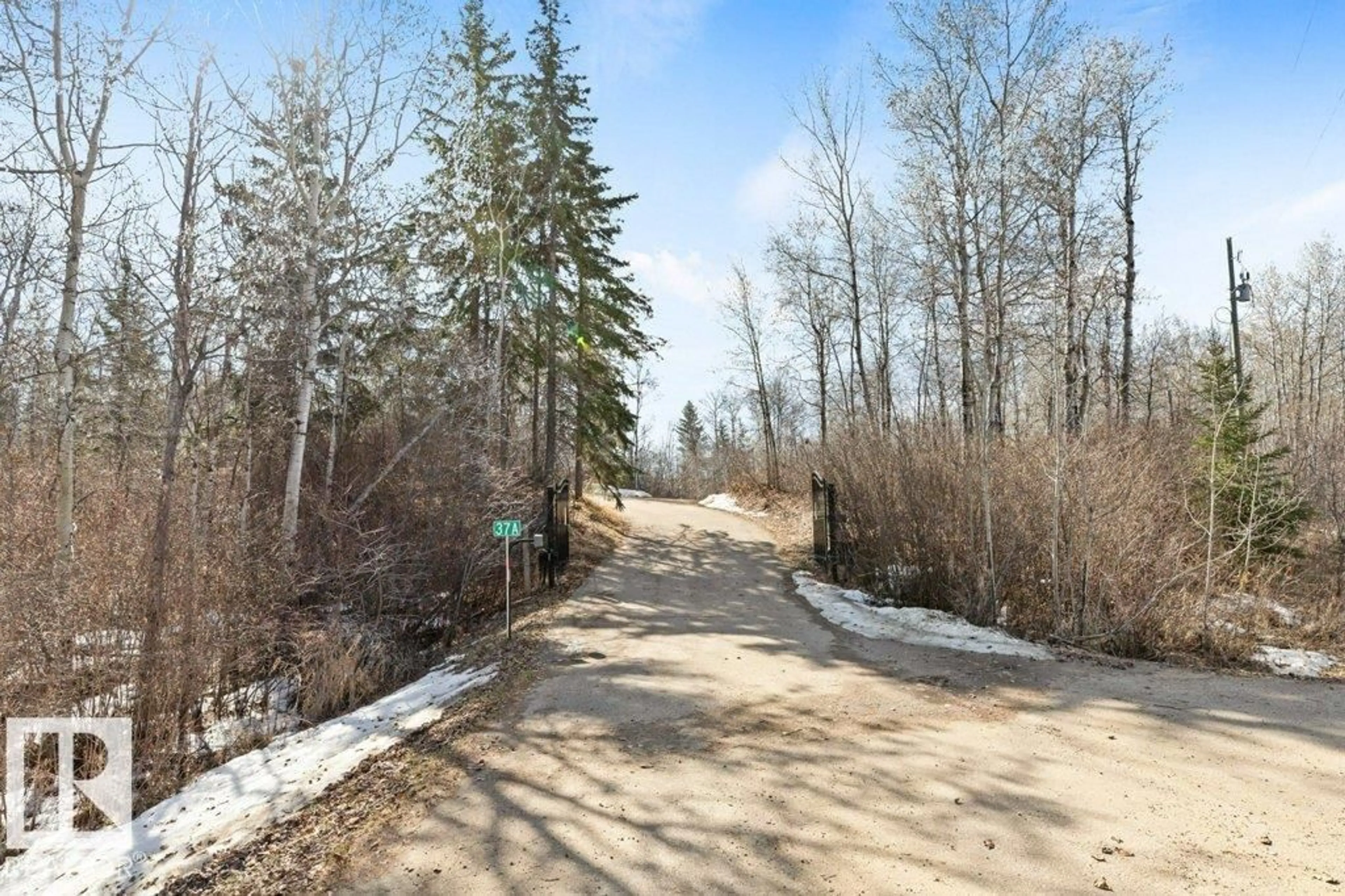 A pic from outside/outdoor area/front of a property/back of a property/a pic from drone, forest/trees view for 627 - 37A HGHWAY, Rural Parkland County Alberta T7Y1C7