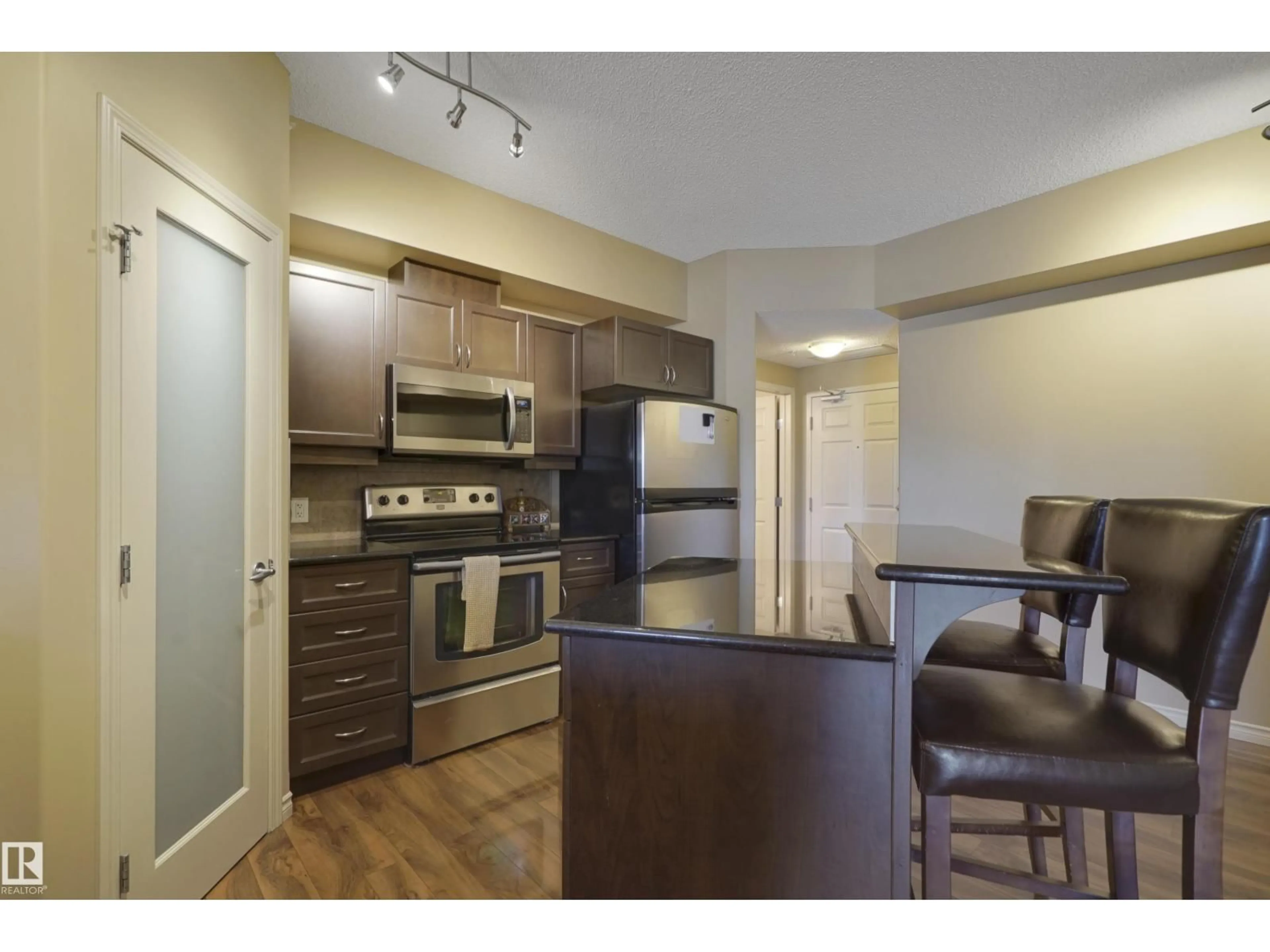 Standard kitchen, wood/laminate floor for 10303 - 511 111 ST NW, Edmonton Alberta T5K0C6