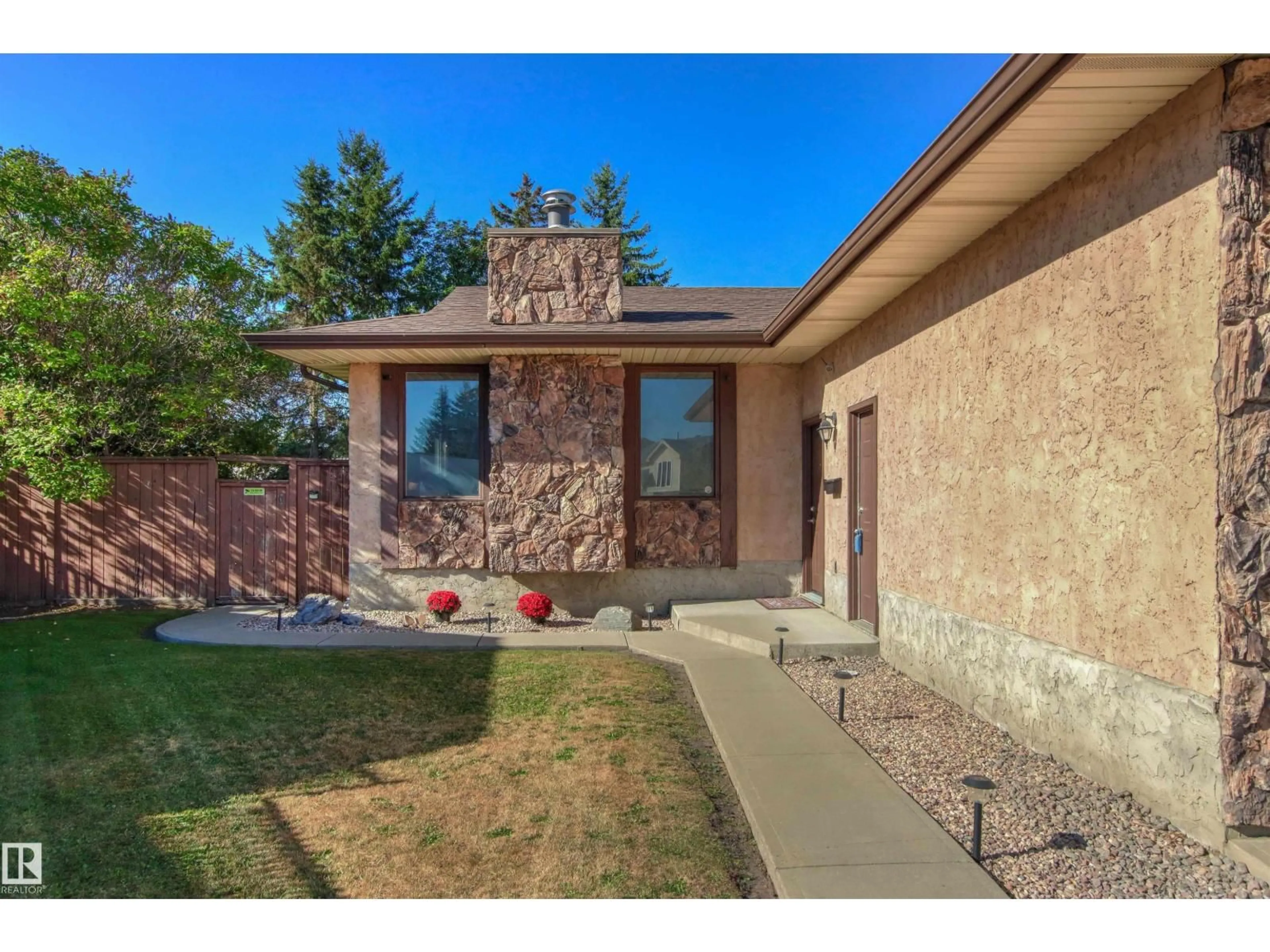 Home with brick exterior material, street for NW - 1704 39 ST, Edmonton Alberta T6L2R5