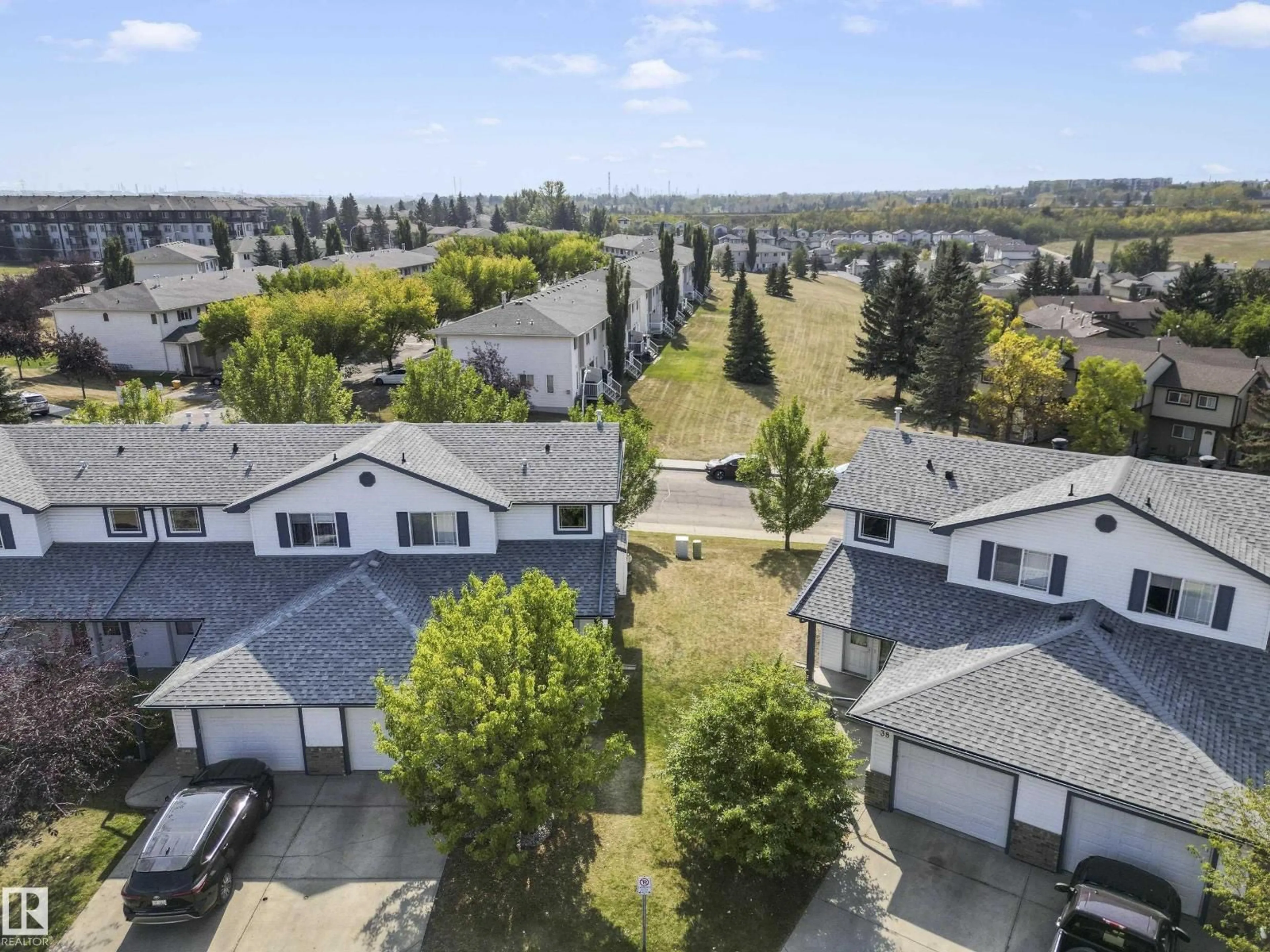 A pic from outside/outdoor area/front of a property/back of a property/a pic from drone, unknown for 450 - 39 HYNDMAN CR, Edmonton Alberta T5A0E2