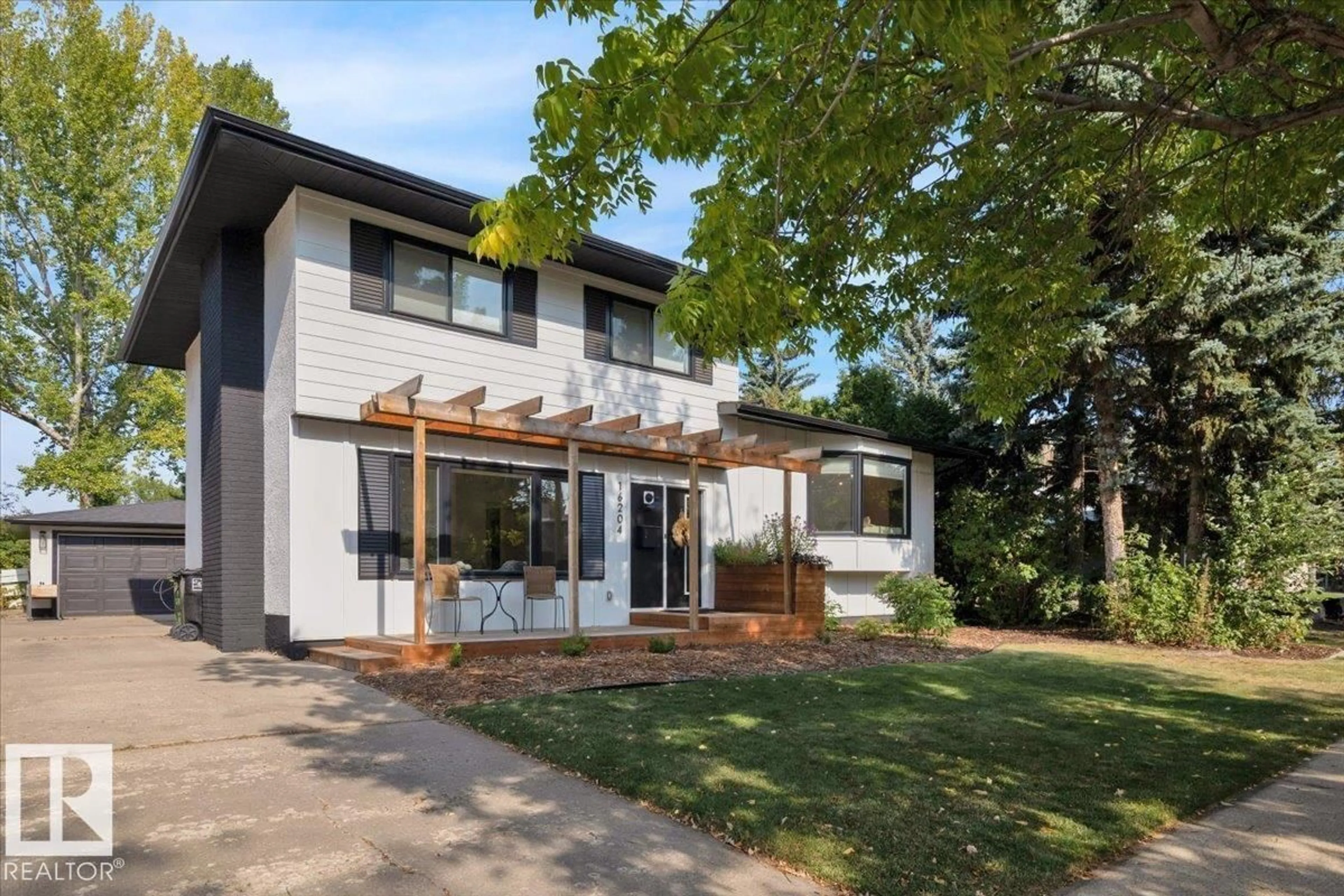 Home with brick exterior material, street for 16204 PATRICIA DR, Edmonton Alberta T5R5N5