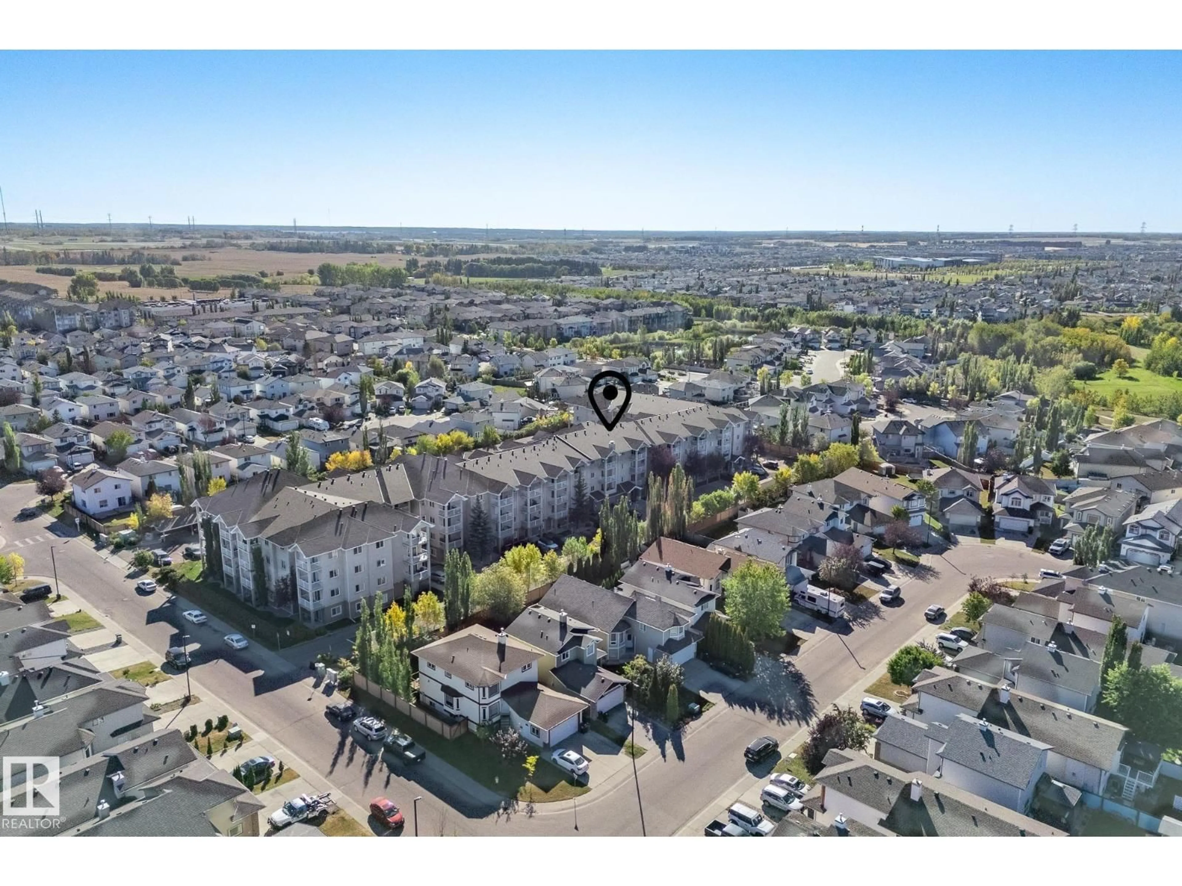 A pic from outside/outdoor area/front of a property/back of a property/a pic from drone, street for #417 - 2305 35A AV, Edmonton Alberta T6T1Z2