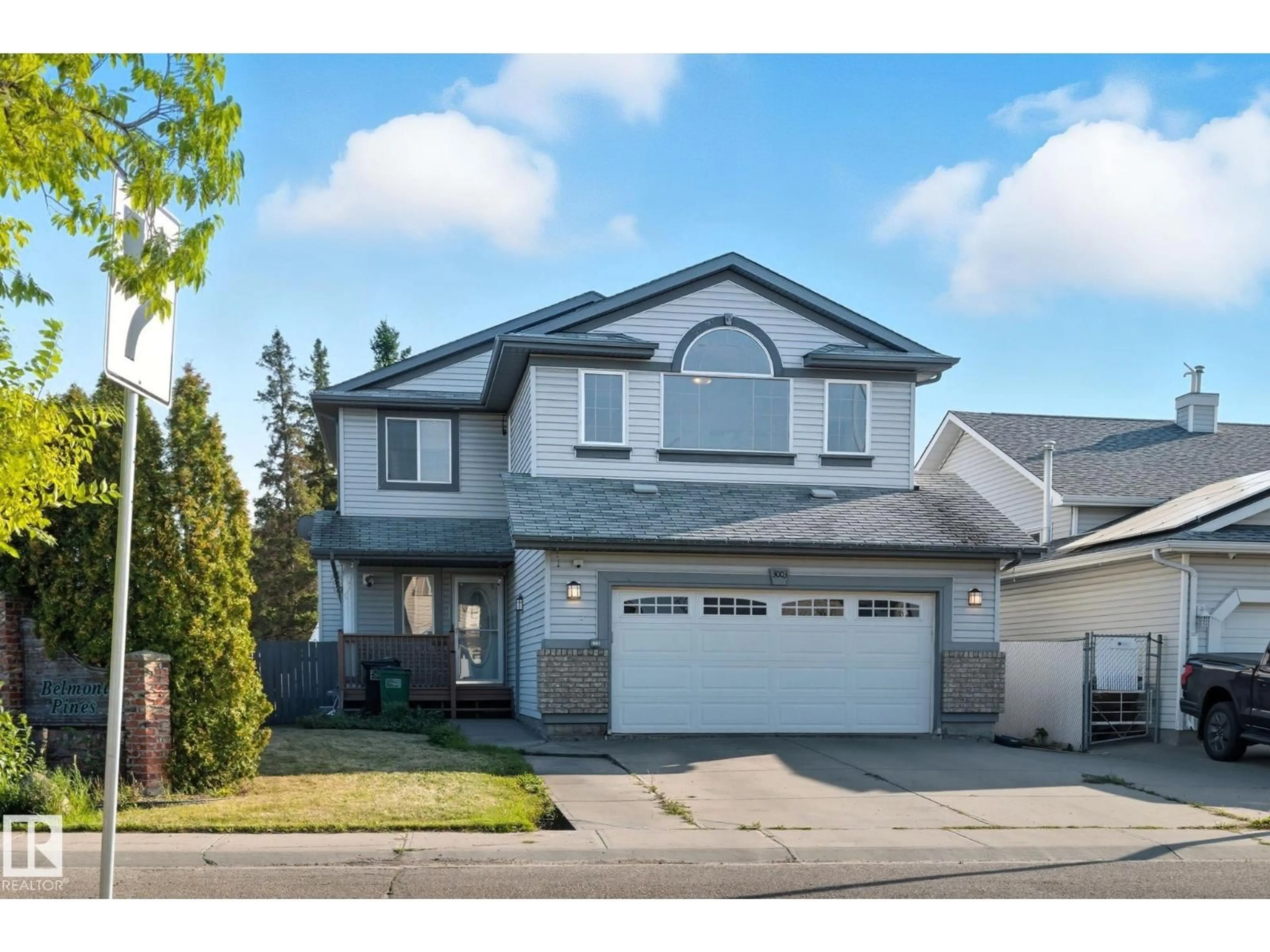 Home with vinyl exterior material, street for 3003 134 AV, Edmonton Alberta T5A5C3
