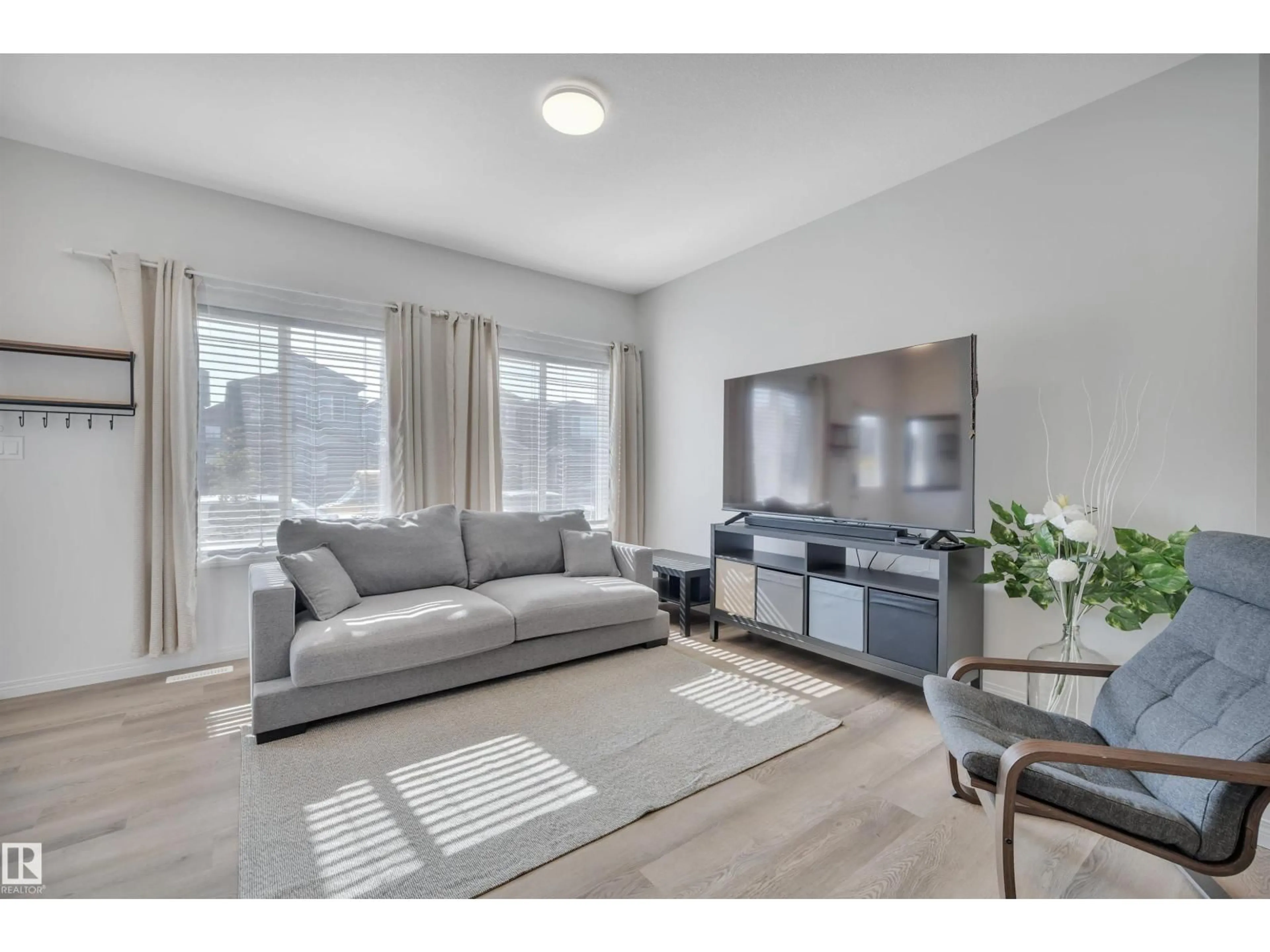 Living room with furniture, unknown for 3714 42 AV, Beaumont Alberta T4X3B3
