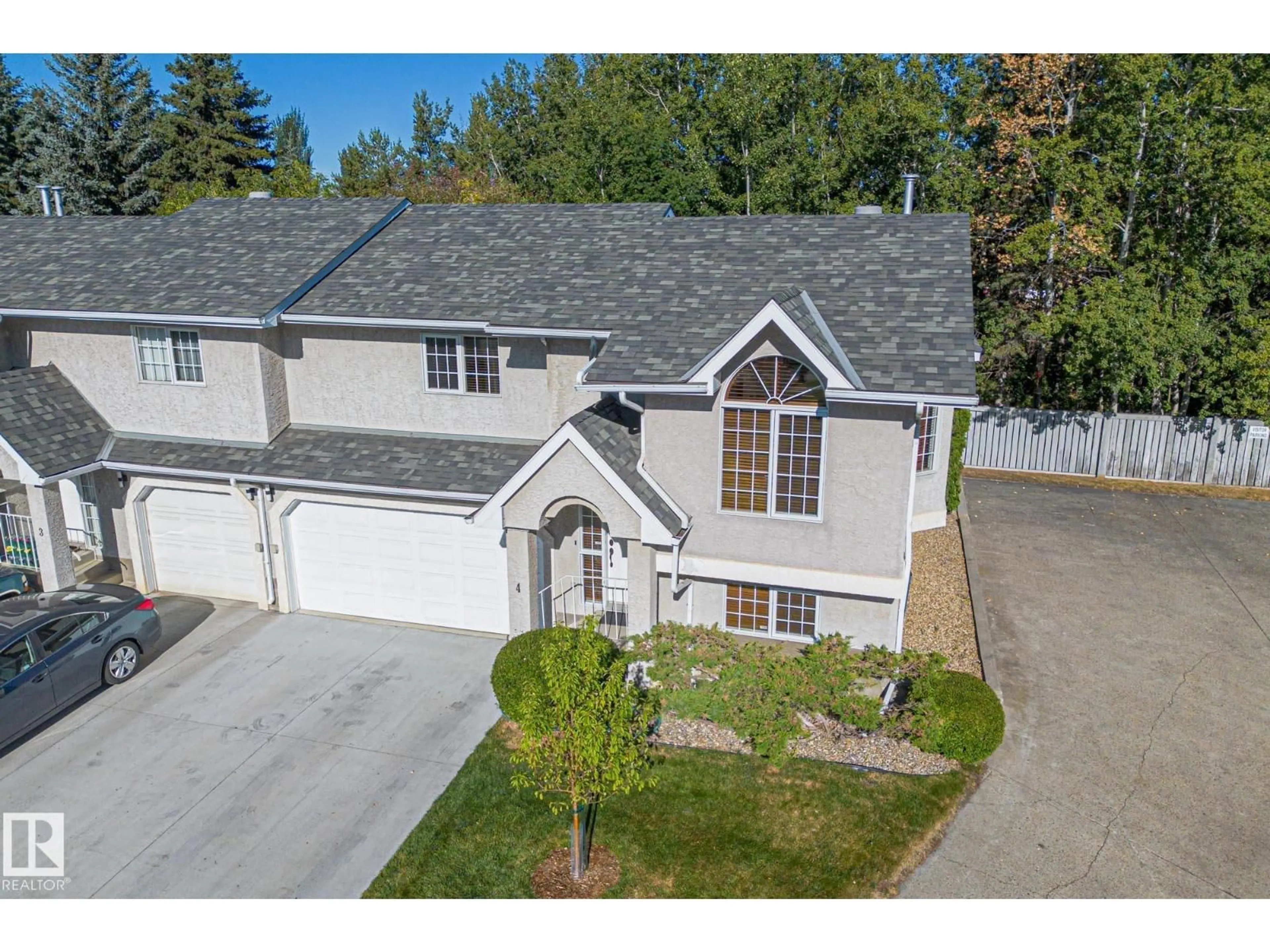 A pic from outside/outdoor area/front of a property/back of a property/a pic from drone, street for #4 - 15 POIRIER AV, St. Albert Alberta T8N4B5