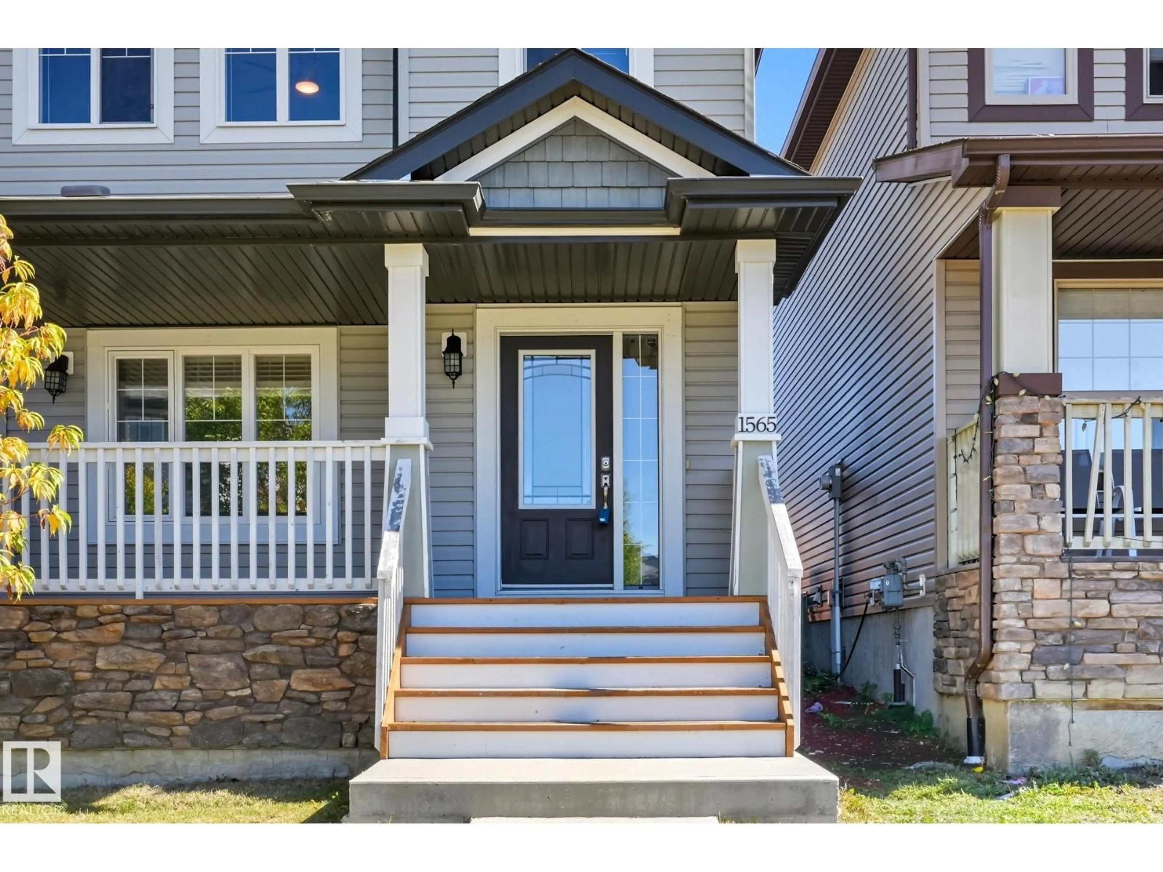 Home with vinyl exterior material, street for 1565 33A ST, Edmonton Alberta T6T0X5