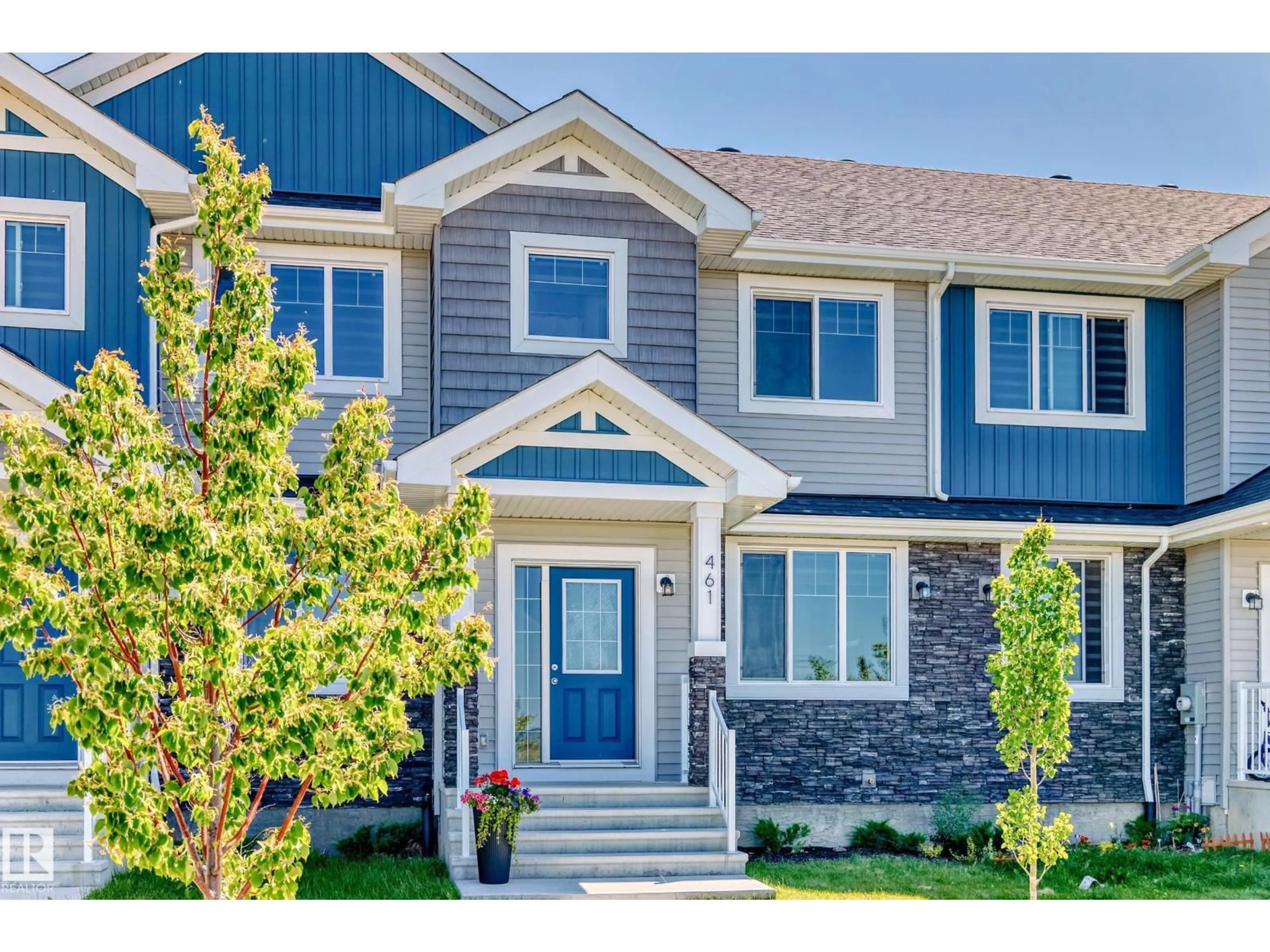 Home with vinyl exterior material, street for 461 GLENRIDDING RAVINE DR, Edmonton Alberta T6W4X3