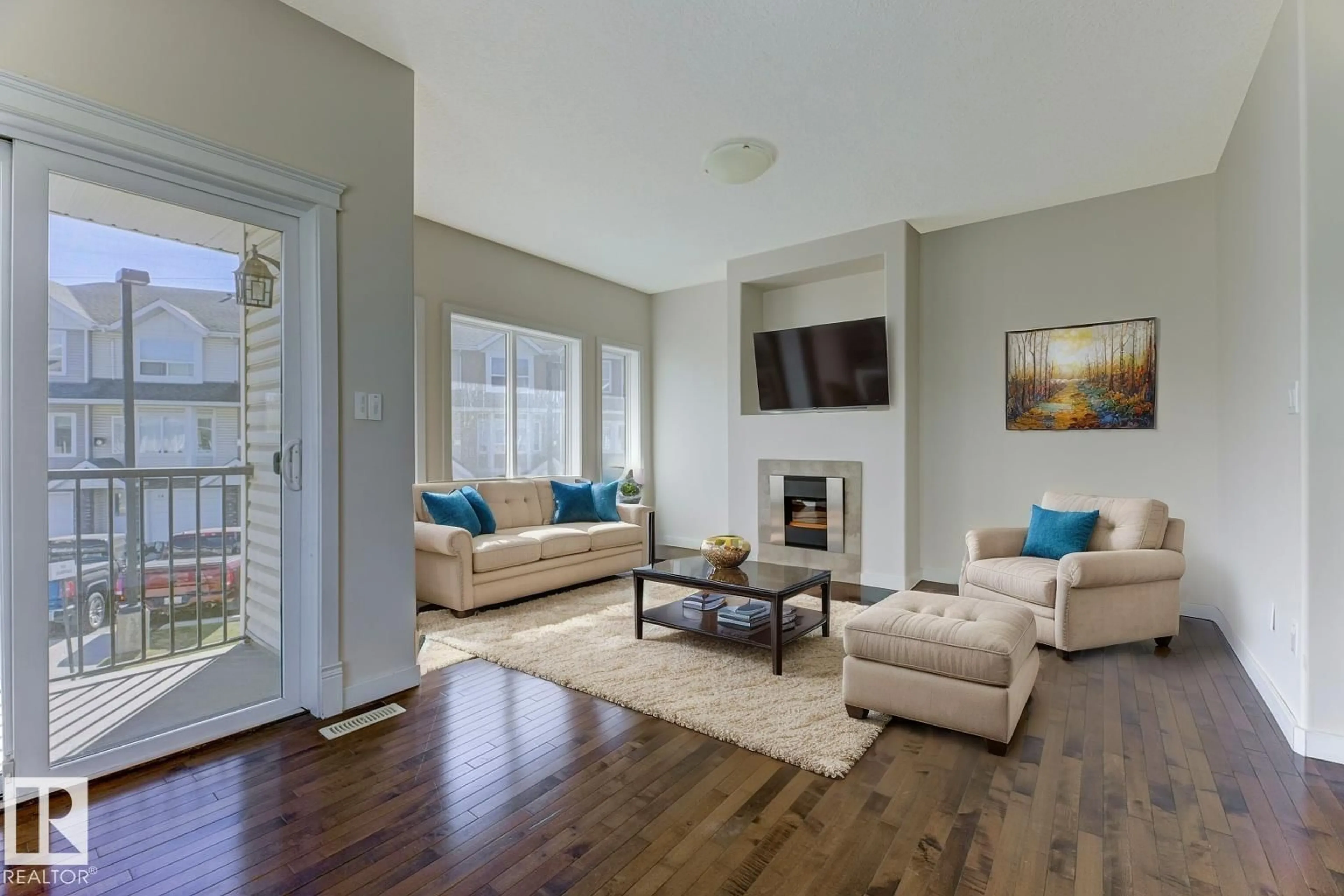 Living room with furniture, wood/laminate floor for #35 - 13215 153 AV, Edmonton Alberta T6X1J7