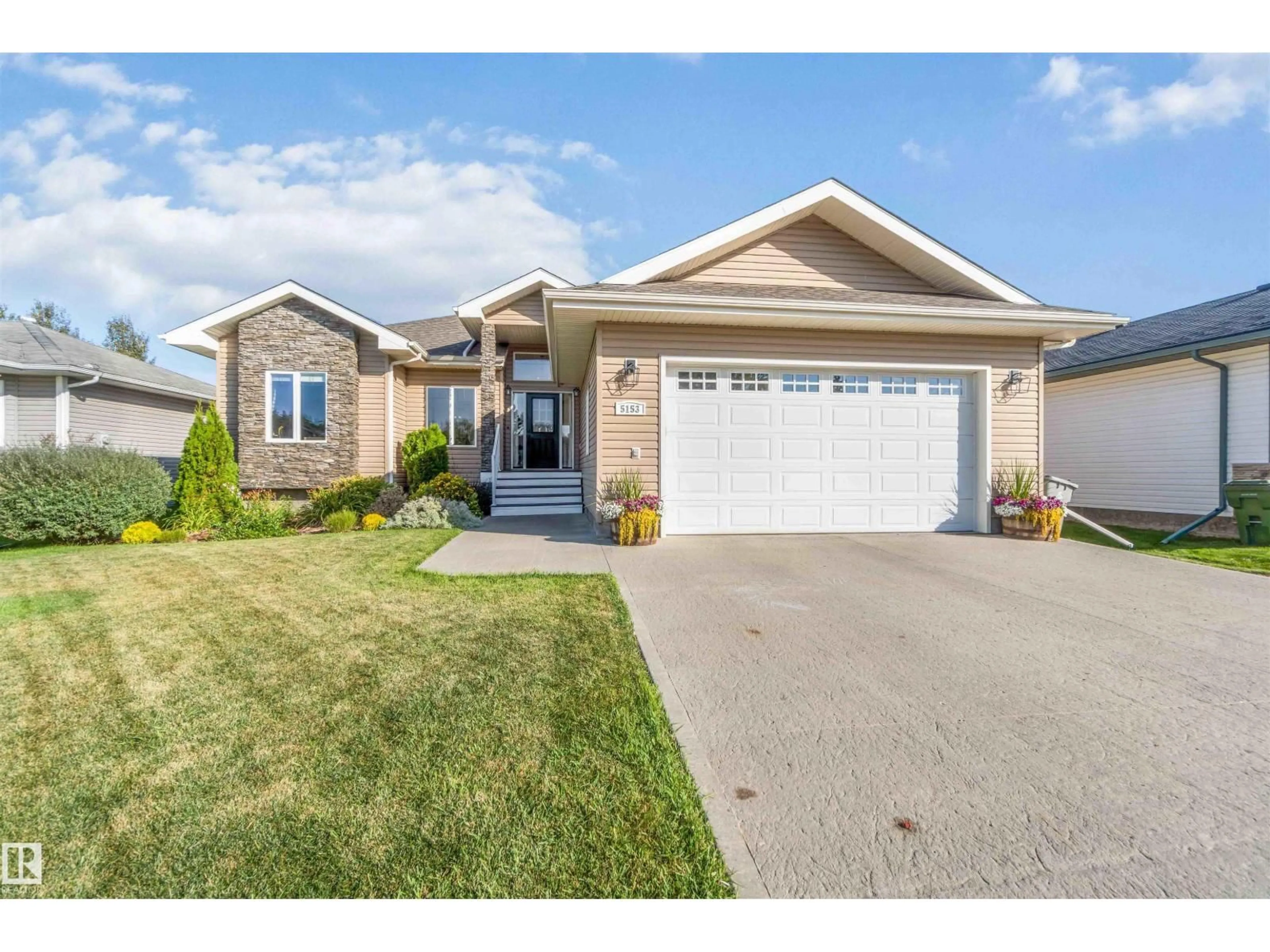 Home with vinyl exterior material, street for 5153 54 AV, Redwater Alberta T0A2W0