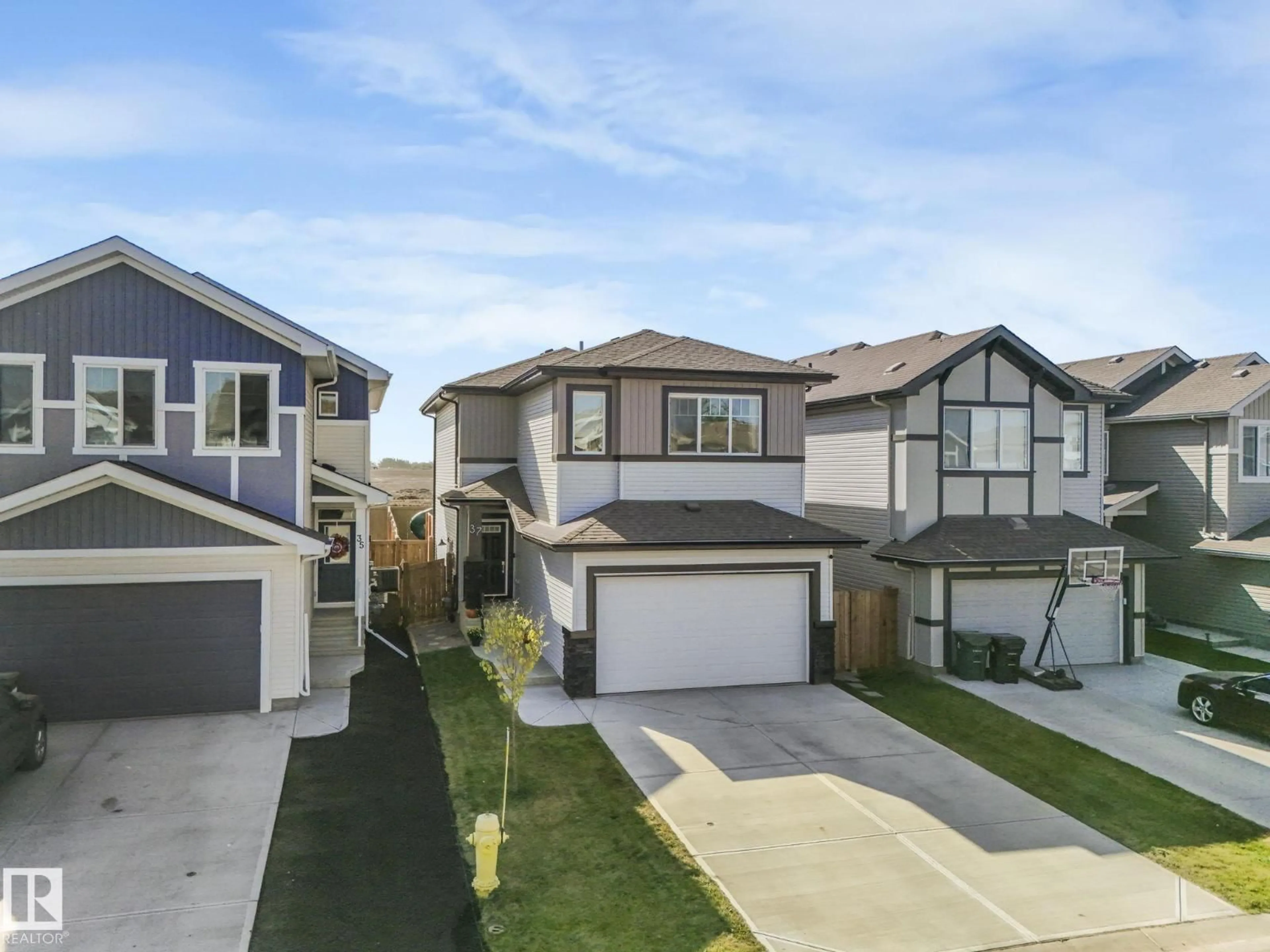 A pic from outside/outdoor area/front of a property/back of a property/a pic from drone, street for 37 SPRINGBROOK WD, Spruce Grove Alberta T7X2W5