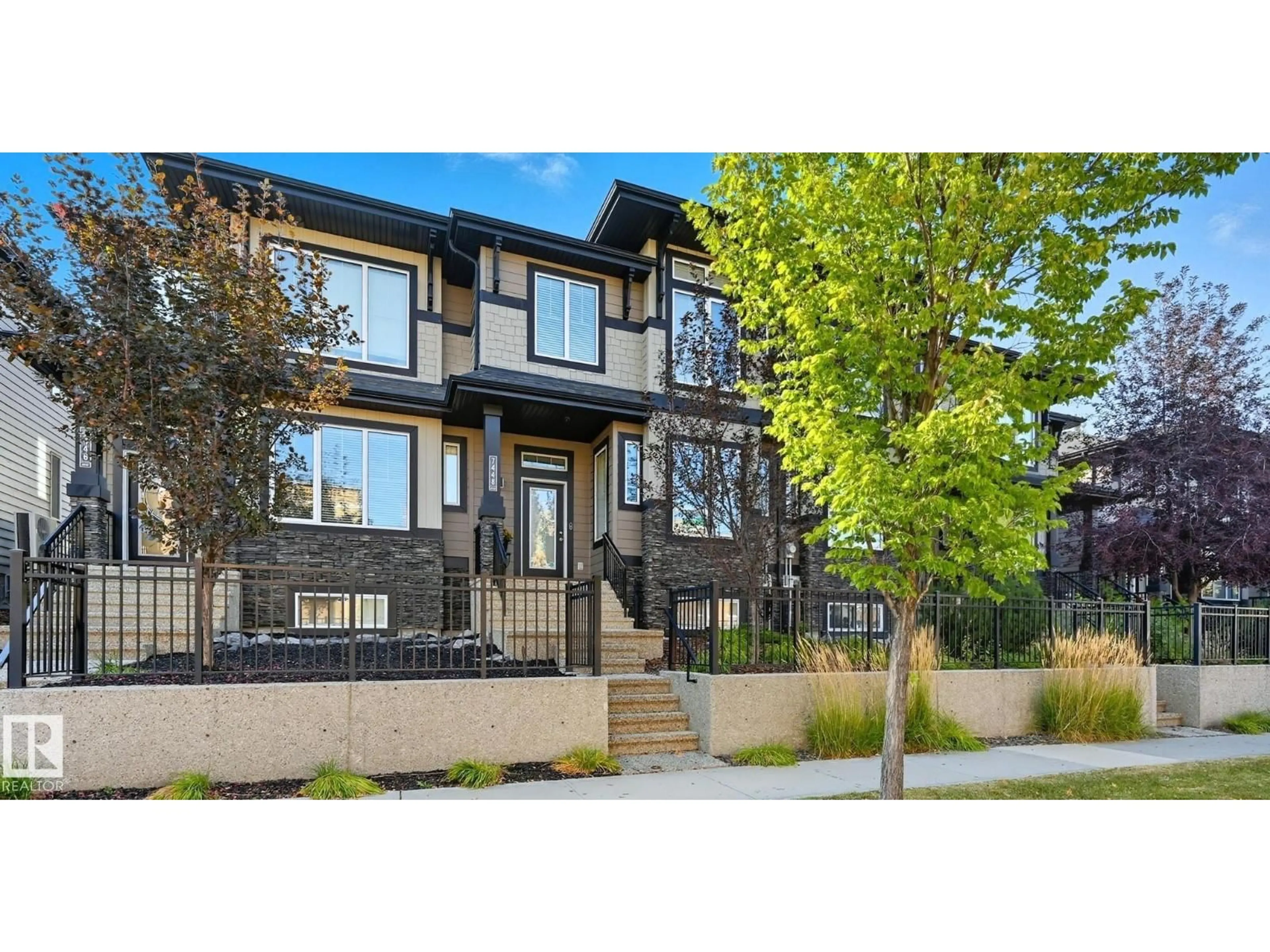 Home with vinyl exterior material, street for NW - 7448 MAY CM, Edmonton Alberta T6R0V2