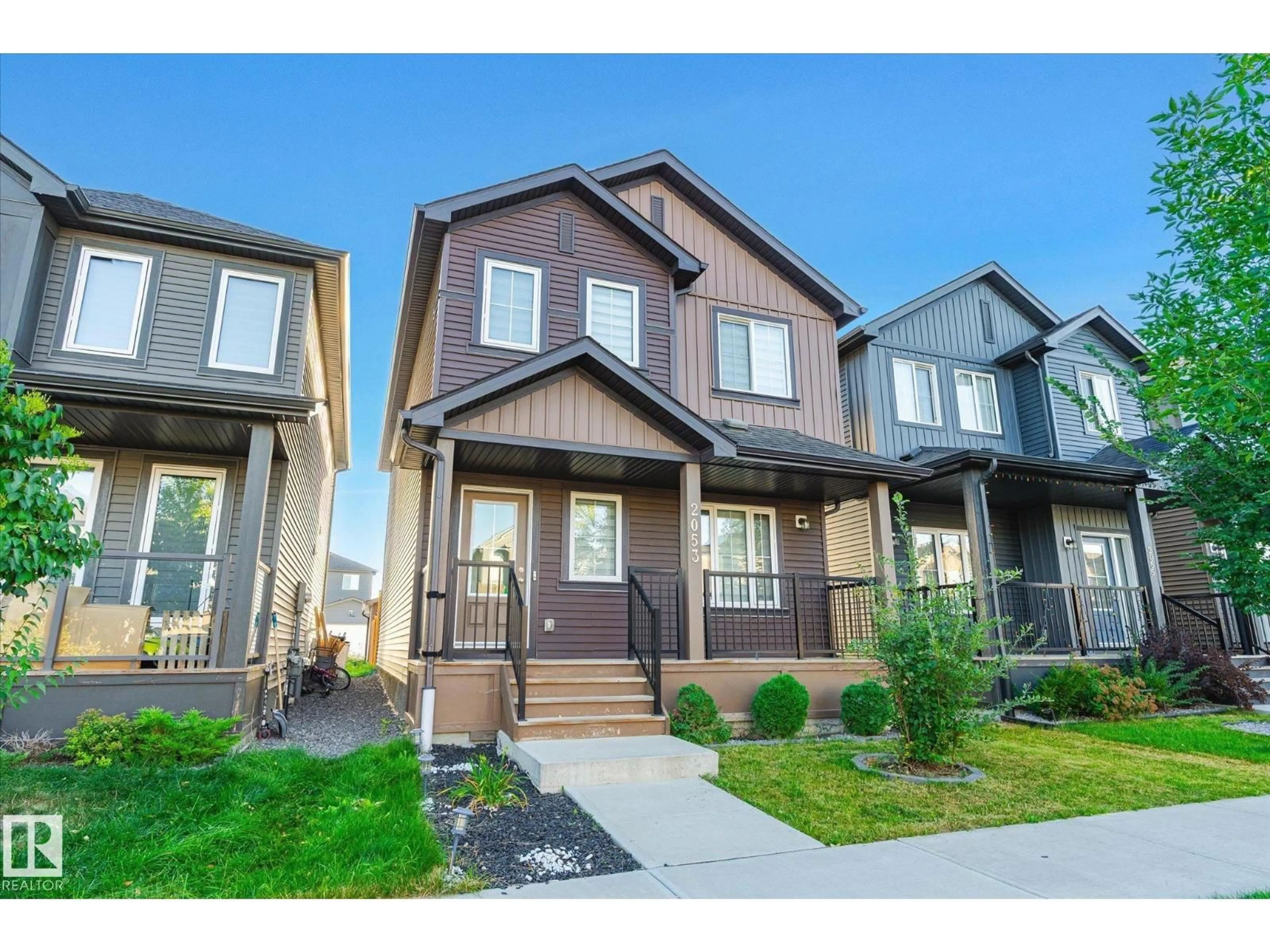Home with vinyl exterior material, street for 2053 GRAYDON HILL CR, Edmonton Alberta T6W4C5