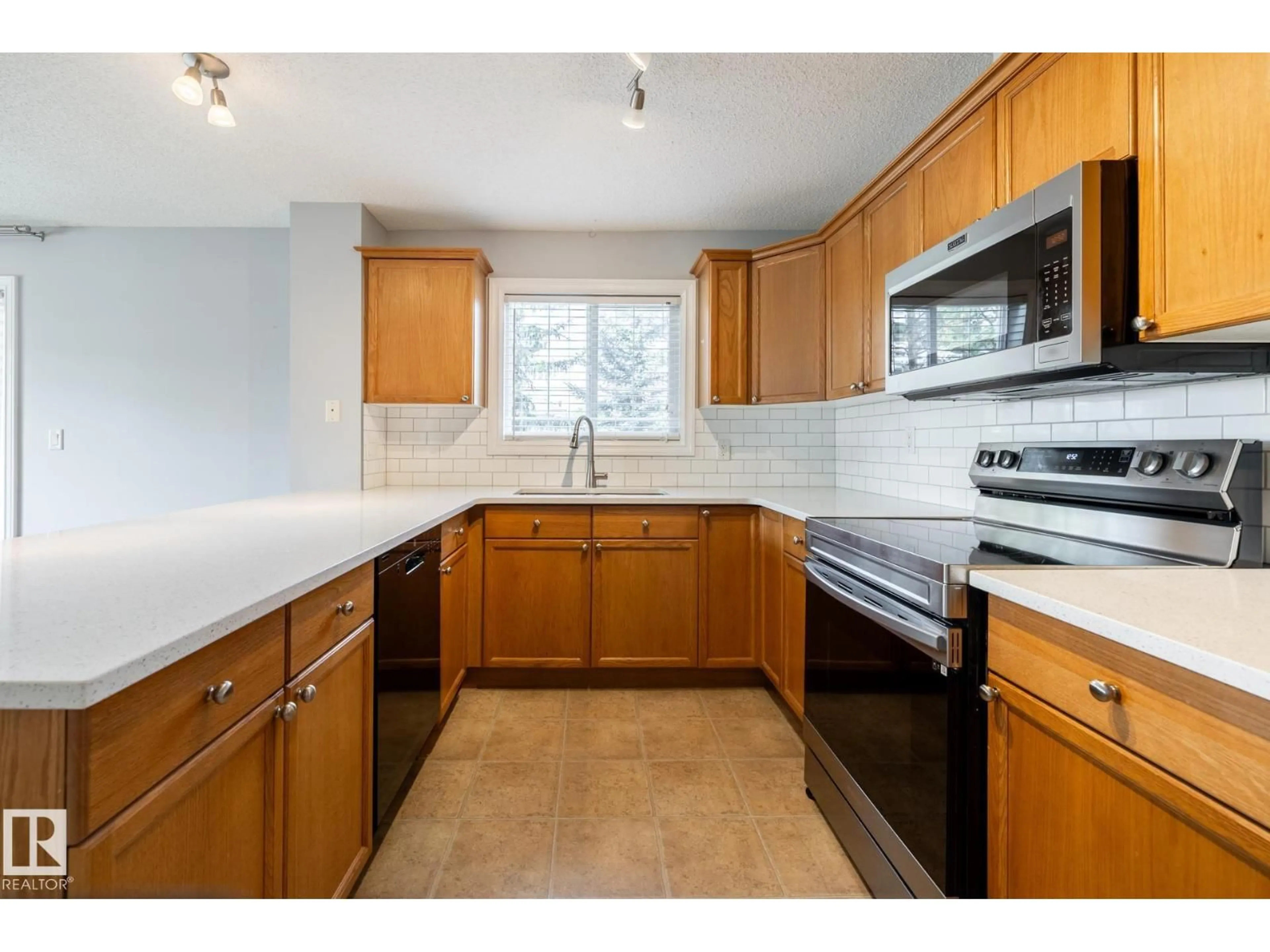 Standard kitchen, ceramic/tile floor for 201 - 4407 23 ST, Edmonton Alberta T6T0B9