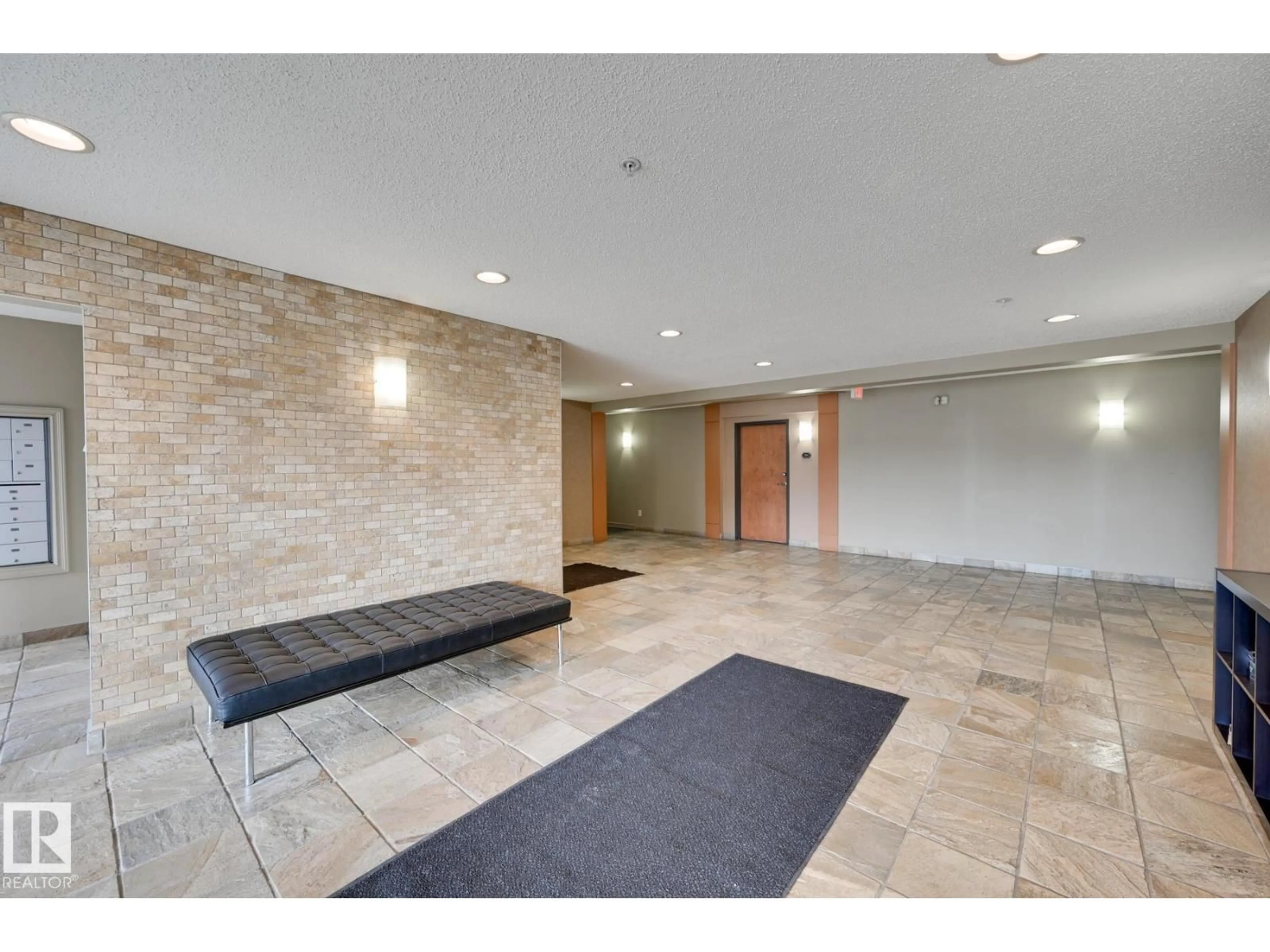Indoor foyer for #215 - 13830 150 AV, Edmonton Alberta T6V1X2