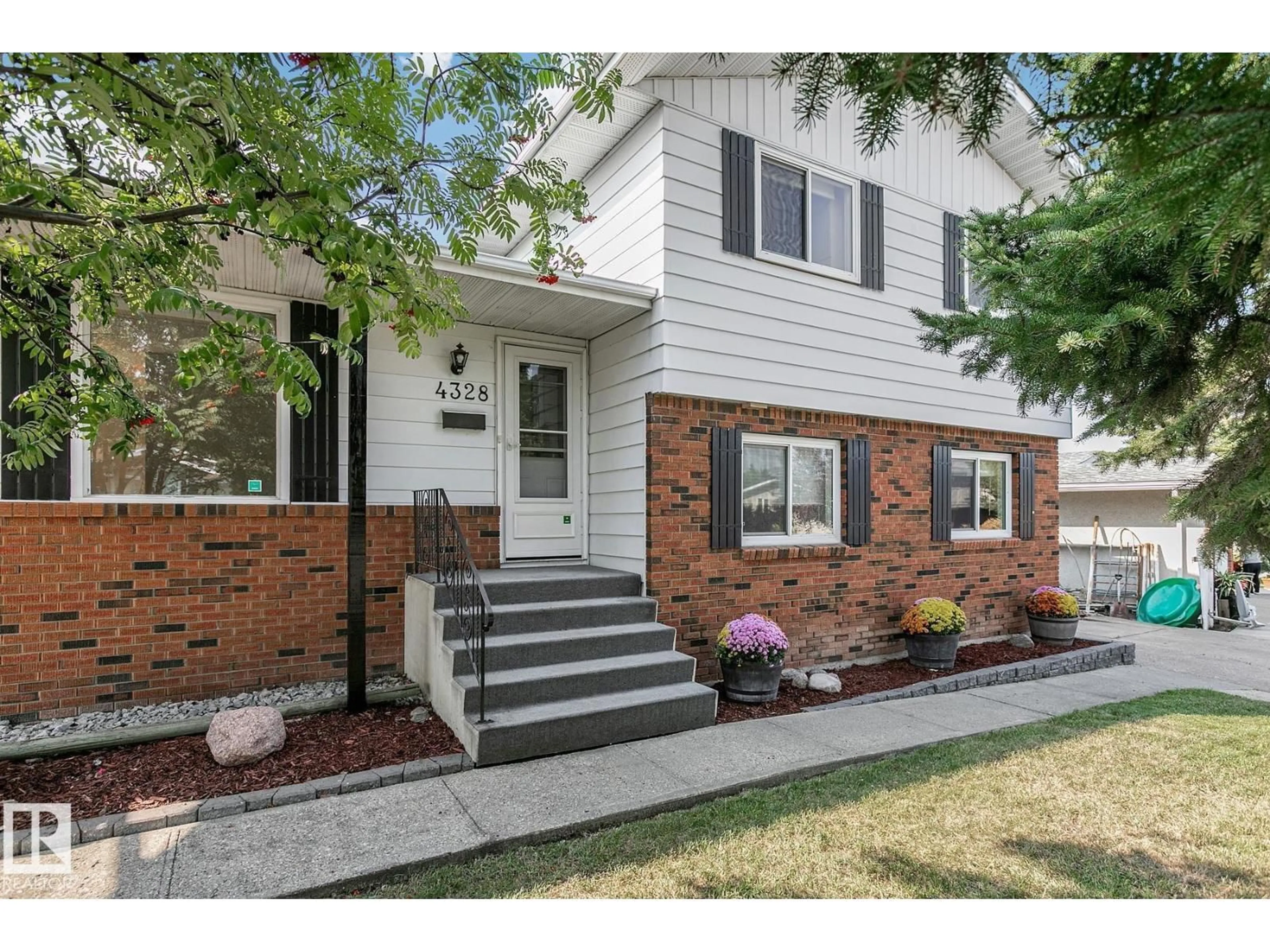 Home with brick exterior material, street for 4328 79 ST, Edmonton Alberta T6K0Y8