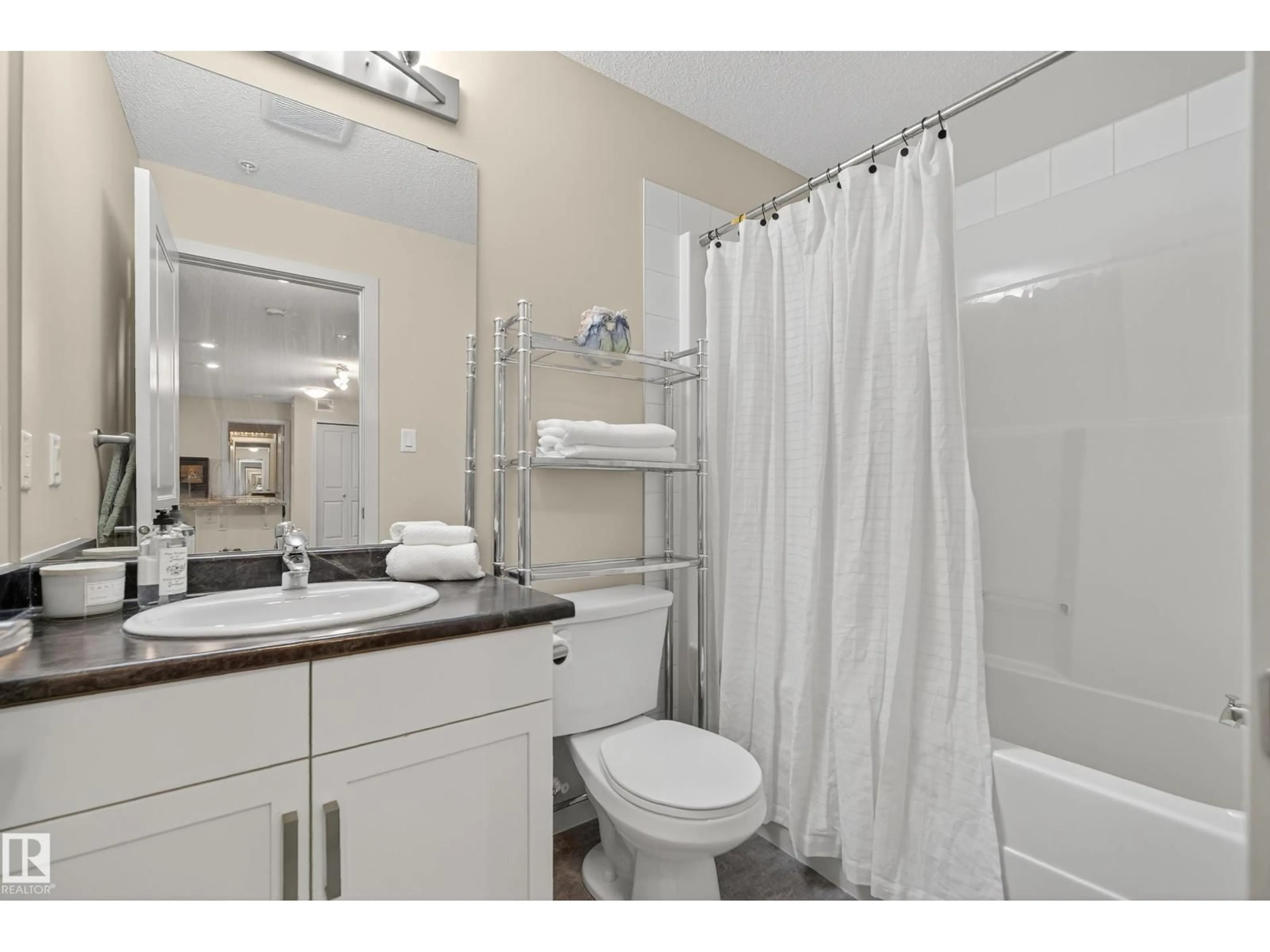 Standard bathroom, ceramic/tile floor for 390 - 133 WINDERMERE RD NW, Edmonton Alberta T6W0R1