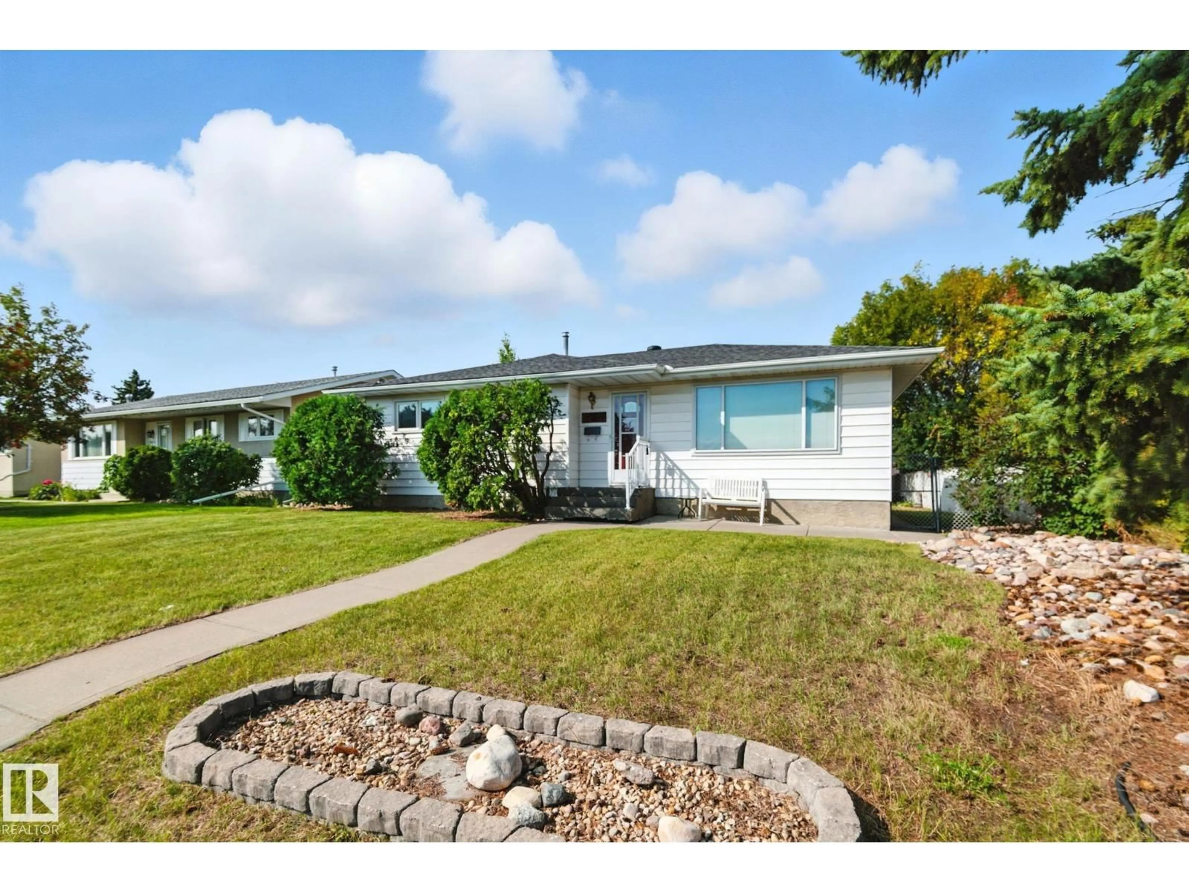 Home with vinyl exterior material, street for 14704 94 ST, Edmonton Alberta T5E3W5