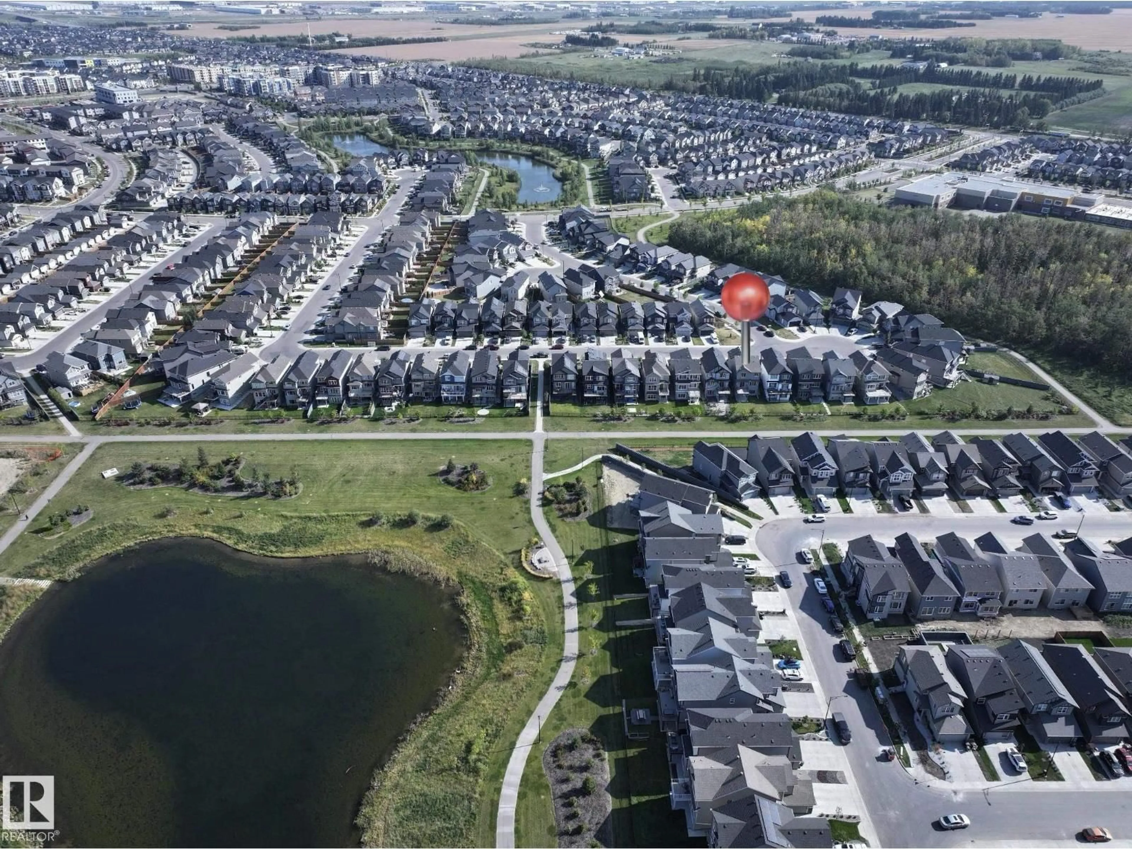 A pic from outside/outdoor area/front of a property/back of a property/a pic from drone, water/lake/river/ocean view for 2684 DONAGHEY CRESCENT, Edmonton Alberta T6W4T1