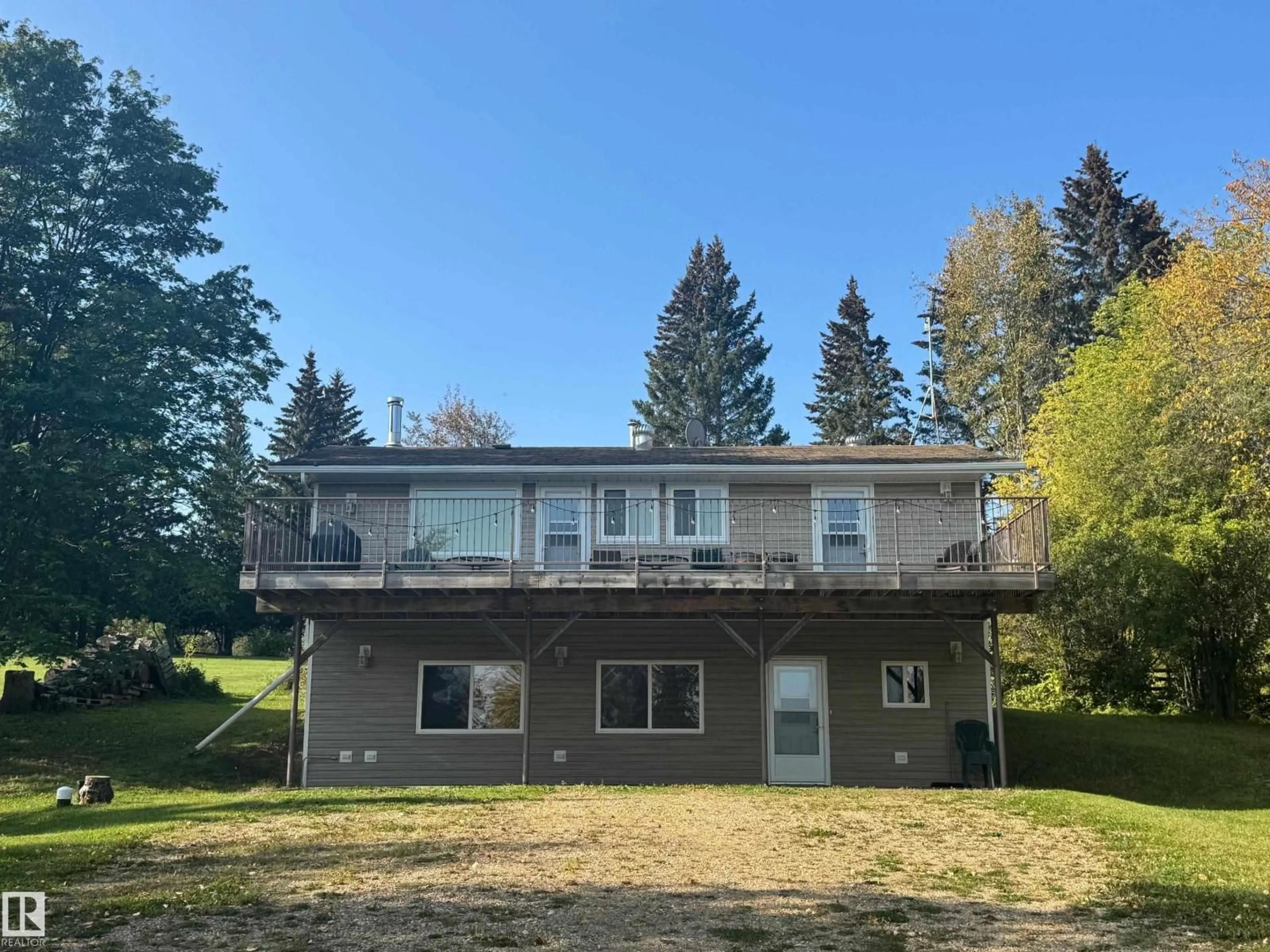 A pic from outside/outdoor area/front of a property/back of a property/a pic from drone, water/lake/river/ocean view for 220 LAKESHORE DR, Rural Athabasca County Alberta T9S1S2