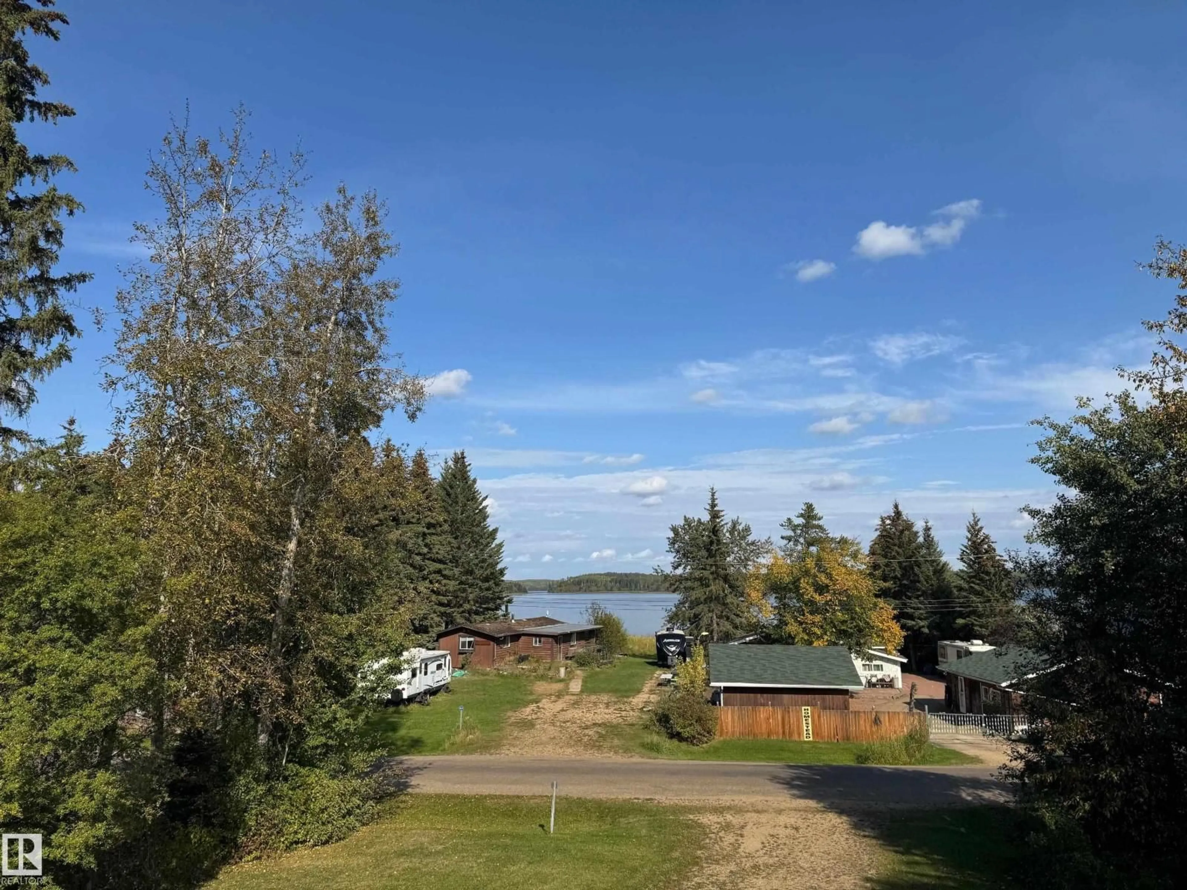 A pic from outside/outdoor area/front of a property/back of a property/a pic from drone, water/lake/river/ocean view for 220 LAKESHORE DR, Rural Athabasca County Alberta T9S1S2