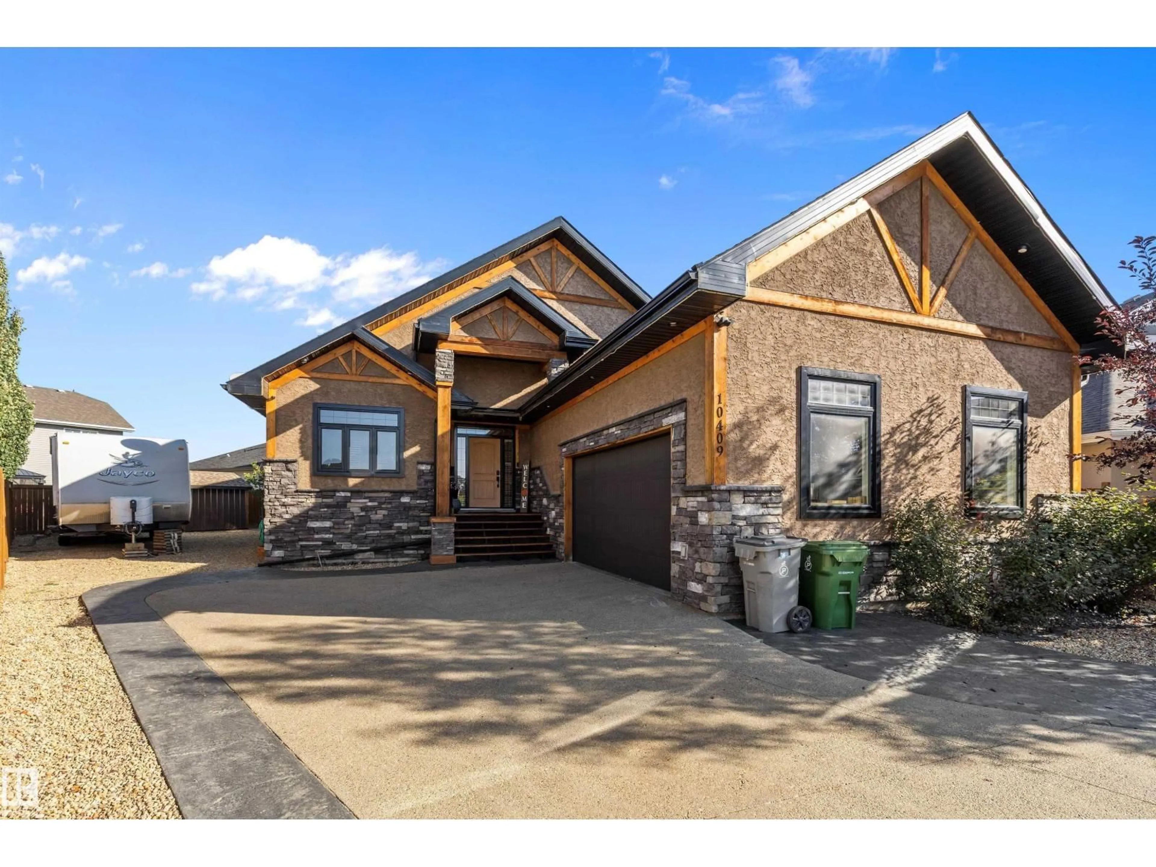 Home with brick exterior material, street for 10409 98 ST, Morinville Alberta T8R0B7