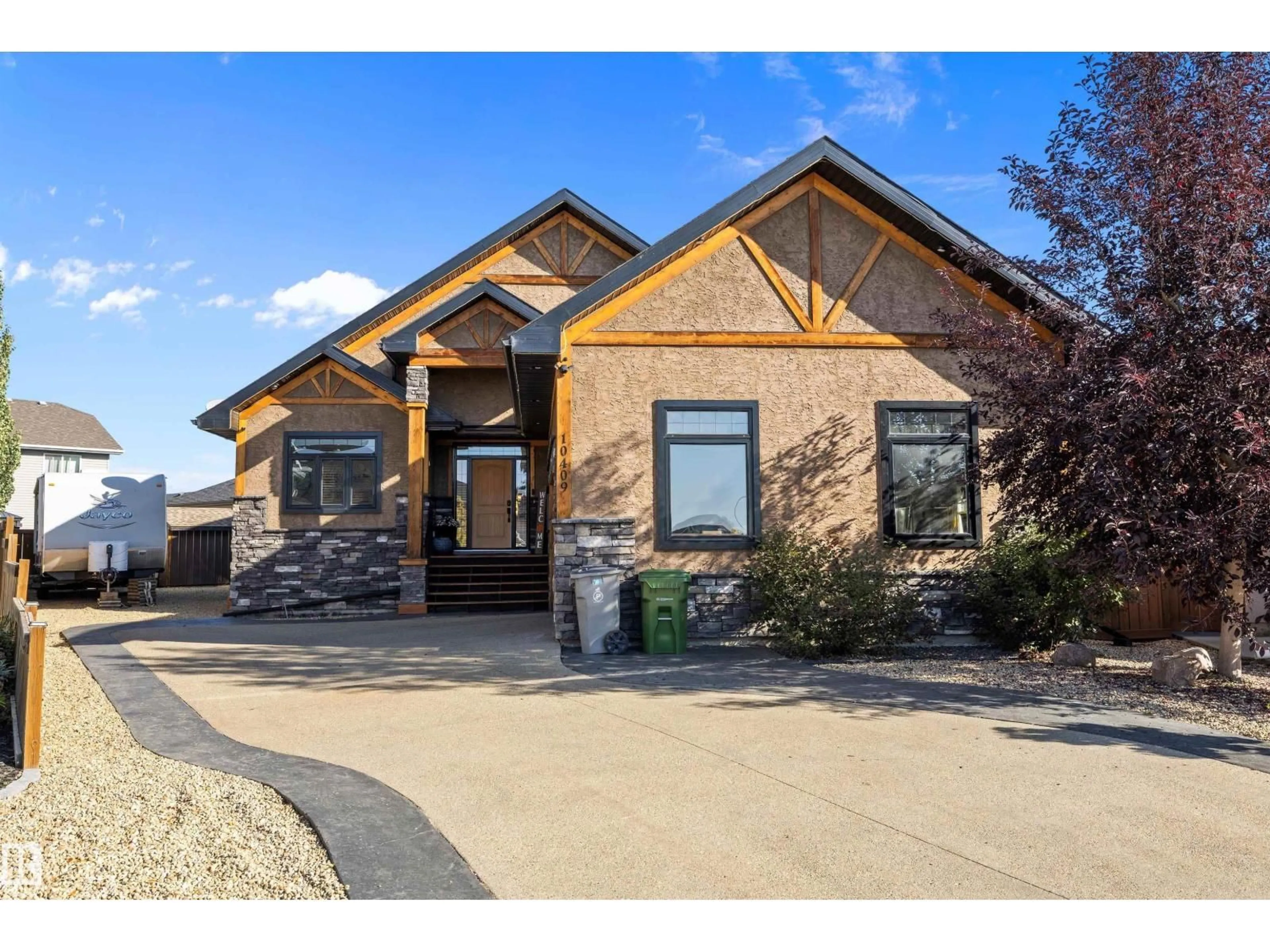 Home with brick exterior material, street for 10409 98 ST, Morinville Alberta T8R0B7