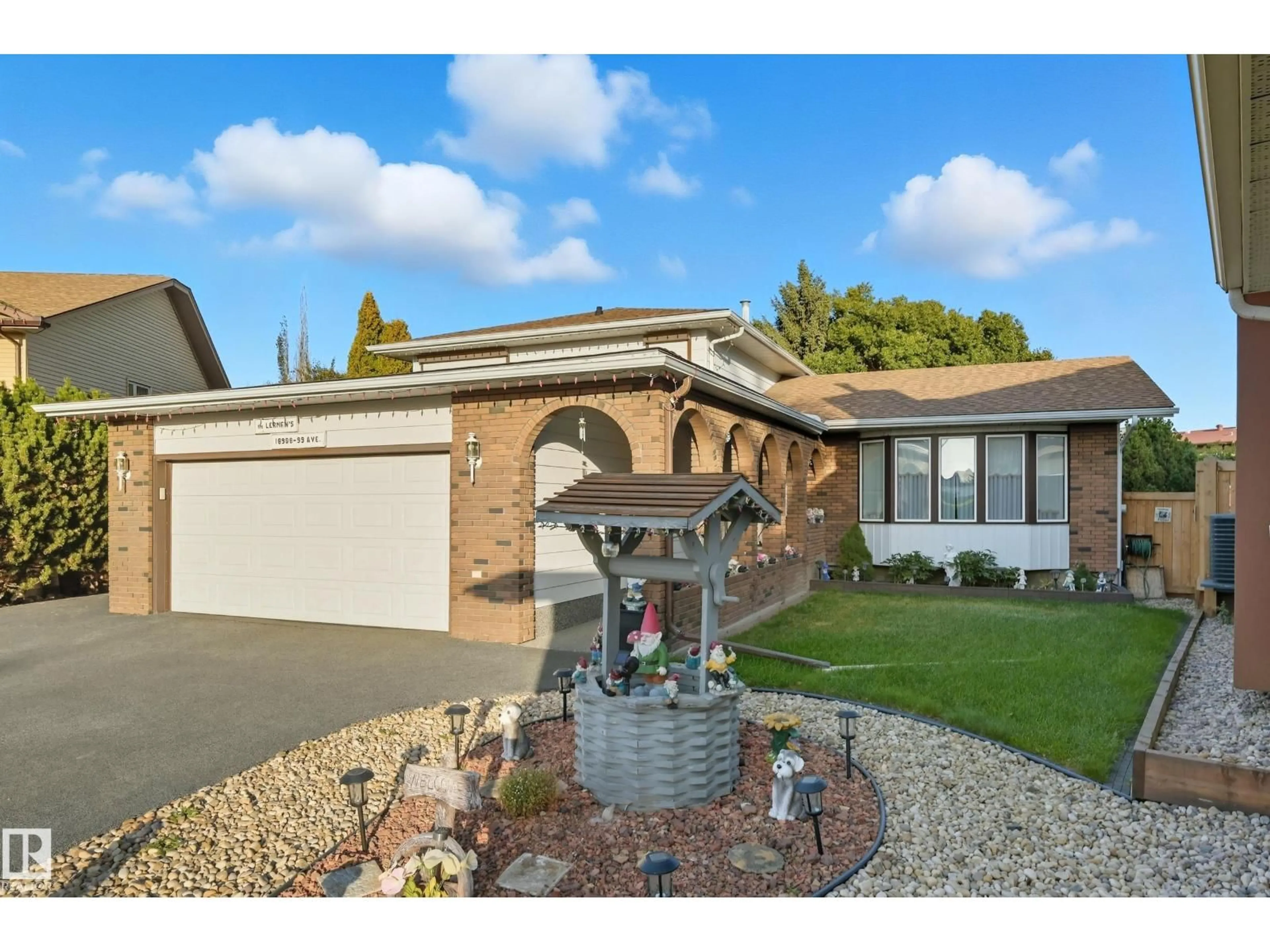 Home with brick exterior material, street for 18908 99 AV, Edmonton Alberta T5T3N1