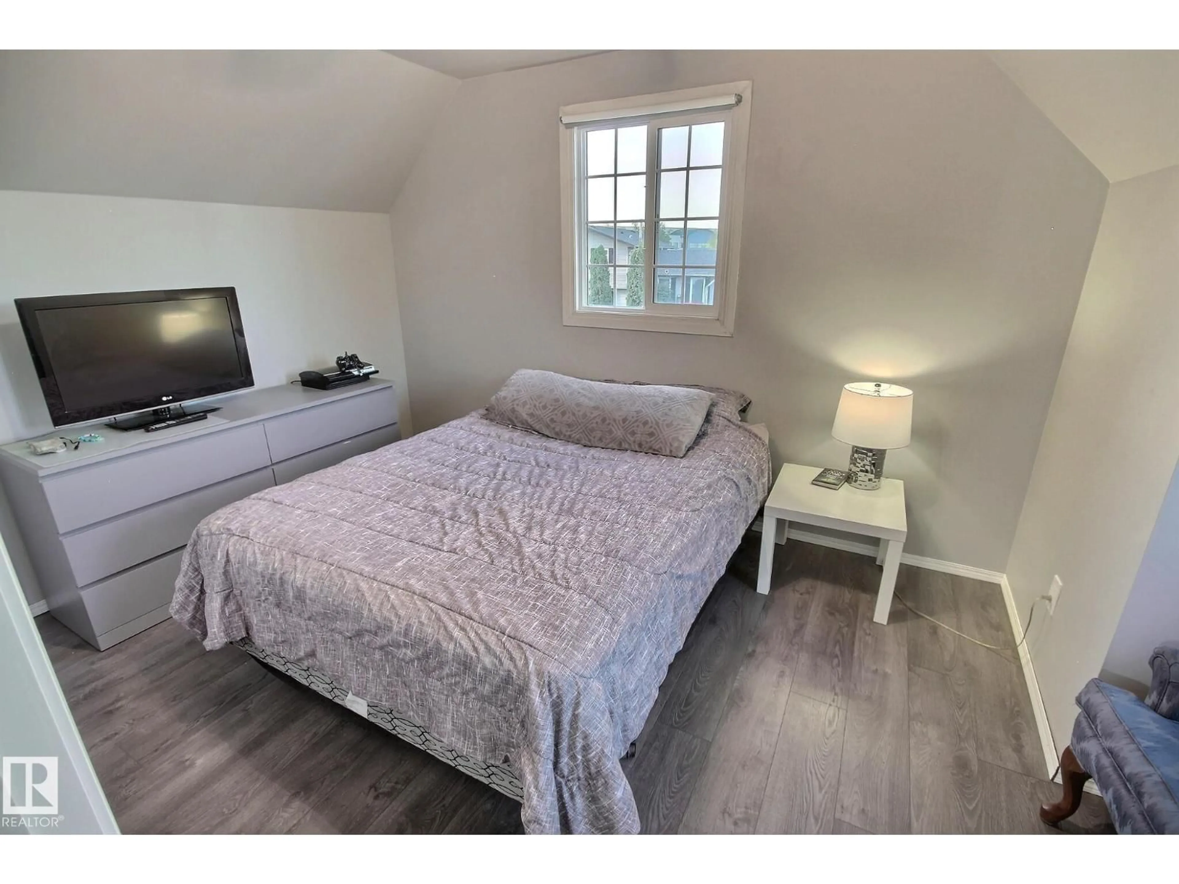 Bedroom with bed, wood/laminate floor for 121 WILLIAM HUSTLER CR, Edmonton Alberta T5A4C1