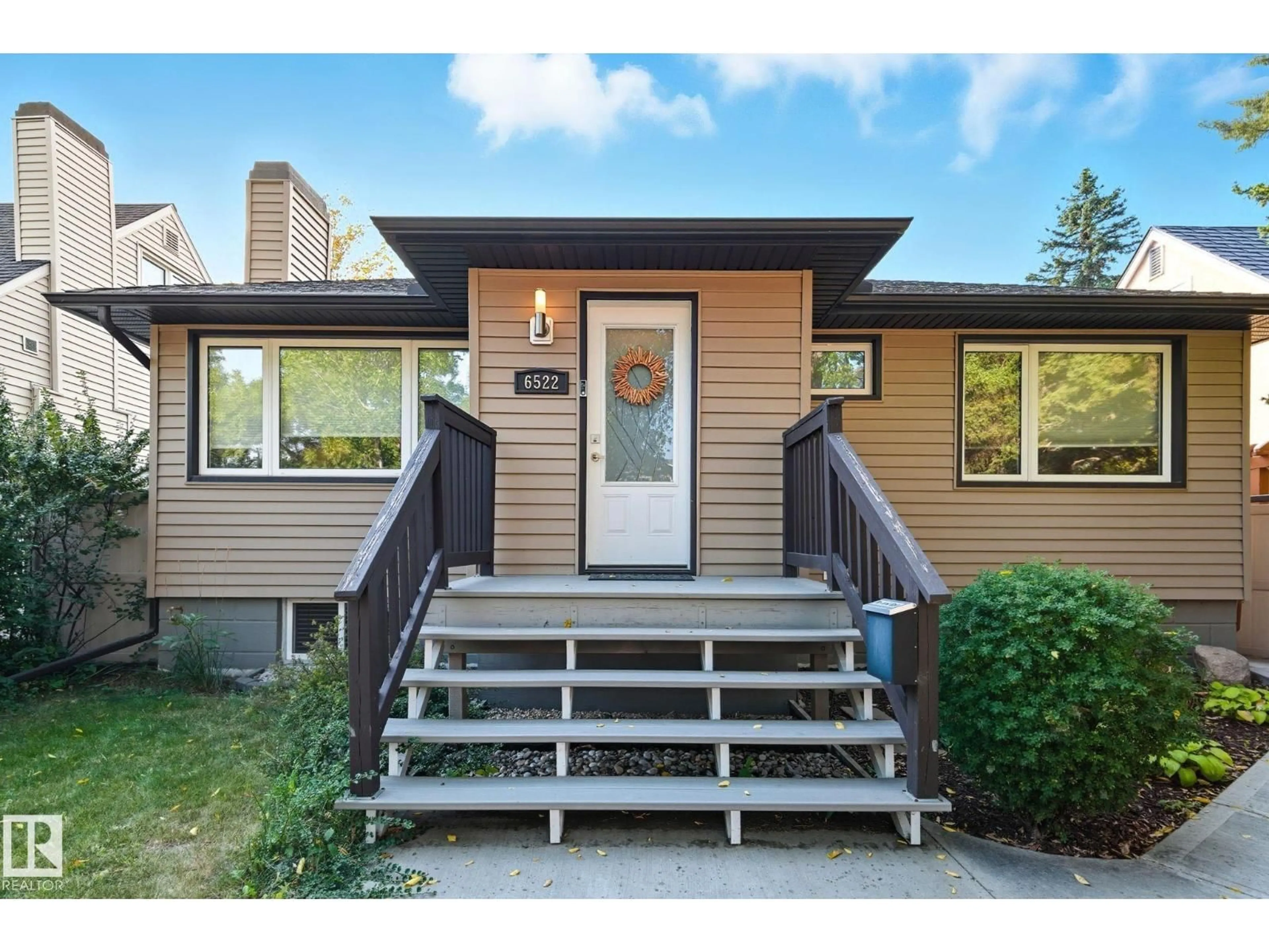 Home with vinyl exterior material, street for 6522 112A ST NW, Edmonton Alberta T6H4R3