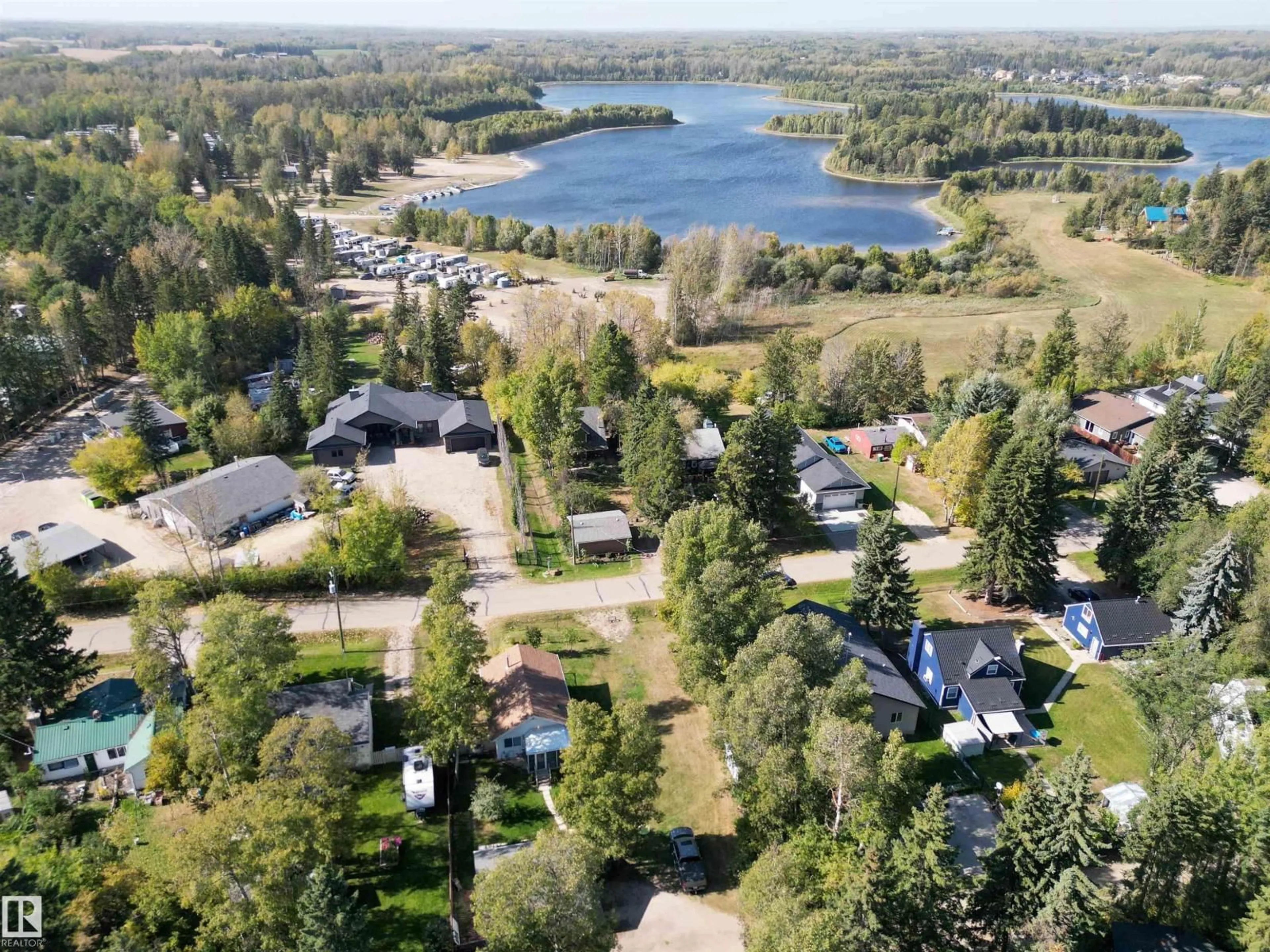 A pic from outside/outdoor area/front of a property/back of a property/a pic from drone, water/lake/river/ocean view for 514 & 515 LAKESIDE DR, Rural Parkland County Alberta T7Z2V5