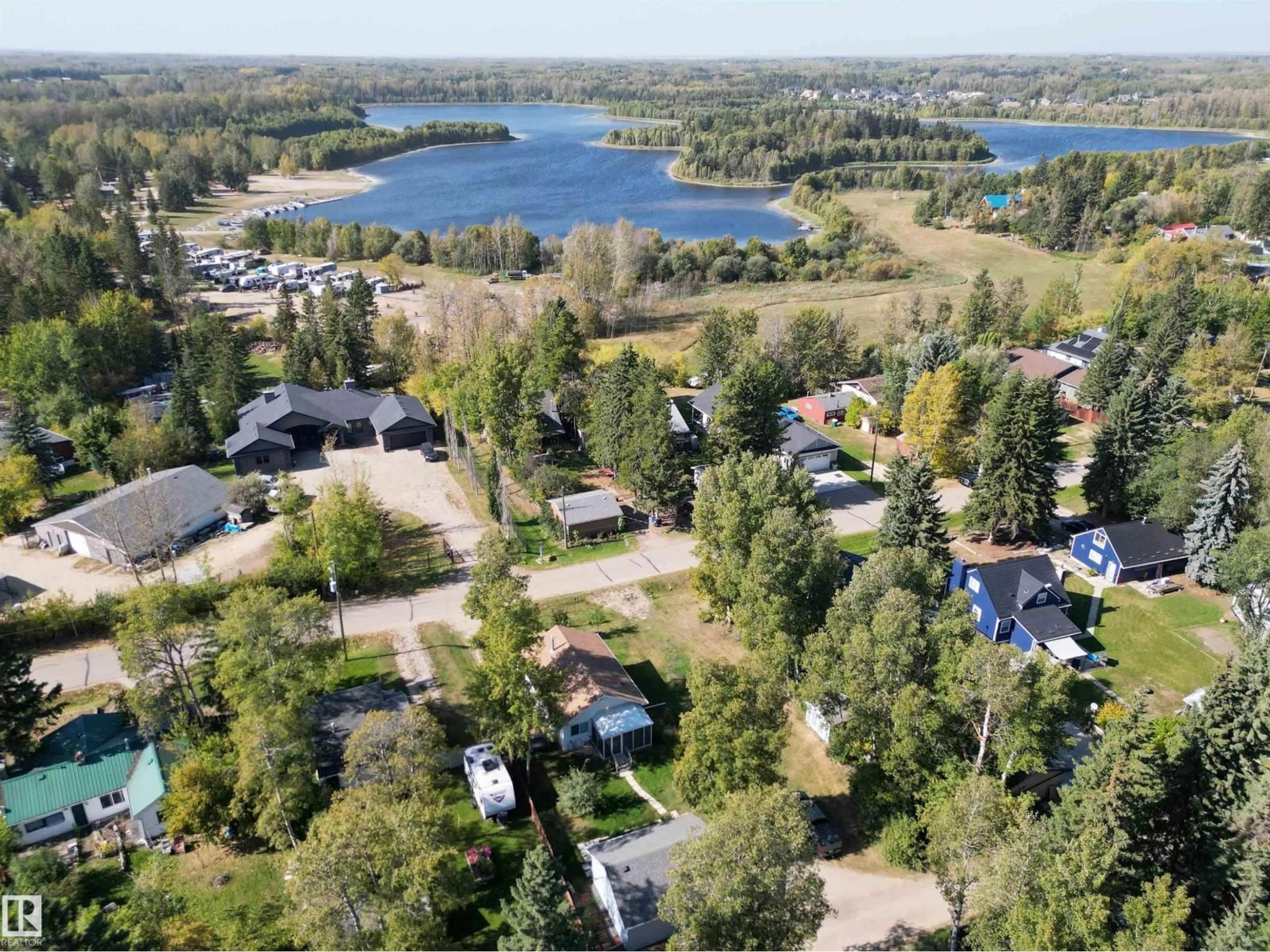 A pic from outside/outdoor area/front of a property/back of a property/a pic from drone, water/lake/river/ocean view for 514 & 515 LAKESIDE DR, Rural Parkland County Alberta T7Z2V5