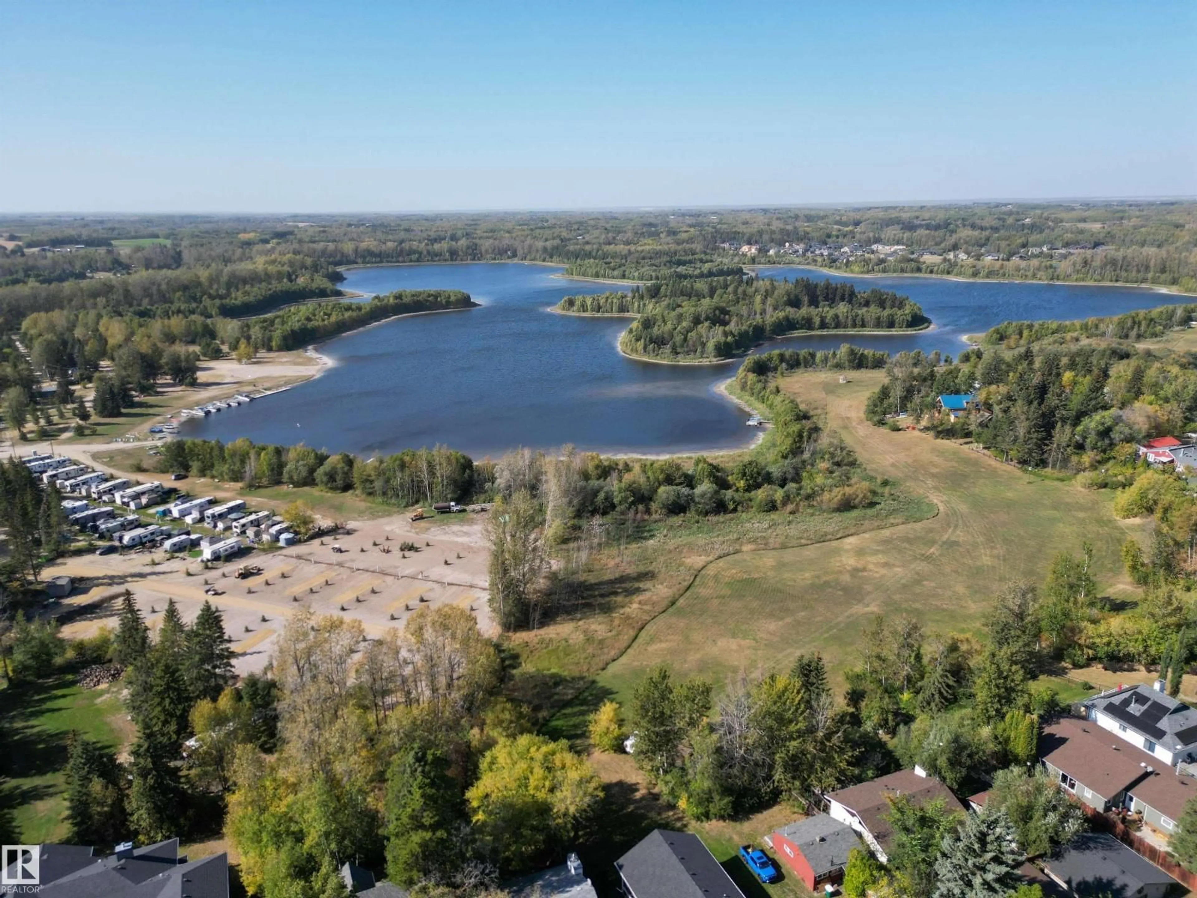 A pic from outside/outdoor area/front of a property/back of a property/a pic from drone, water/lake/river/ocean view for 514 & 515 LAKESIDE DR, Rural Parkland County Alberta T7Z2V5