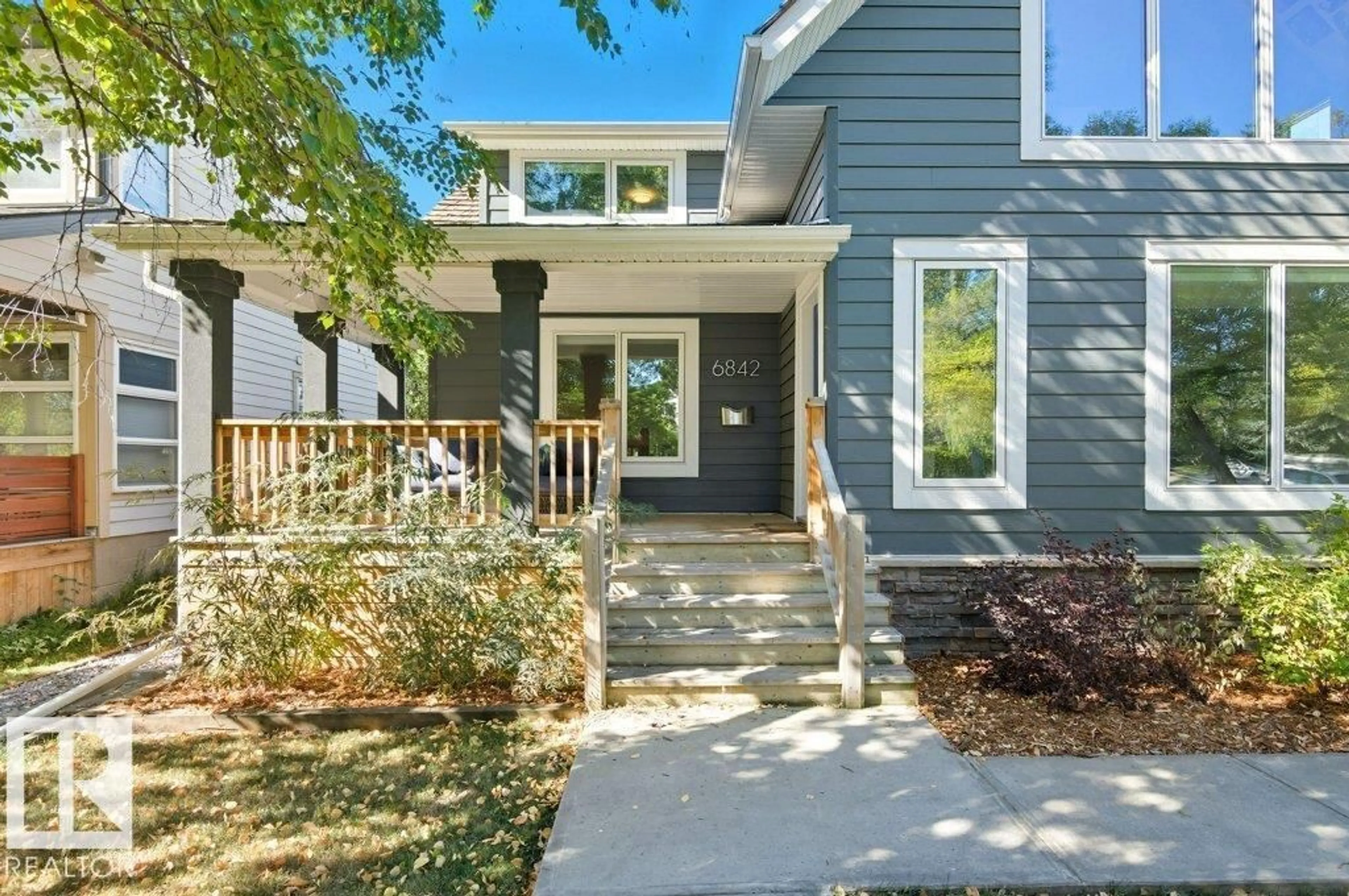 Home with vinyl exterior material, street for 6842 112A ST NW, Edmonton Alberta T6H3K6