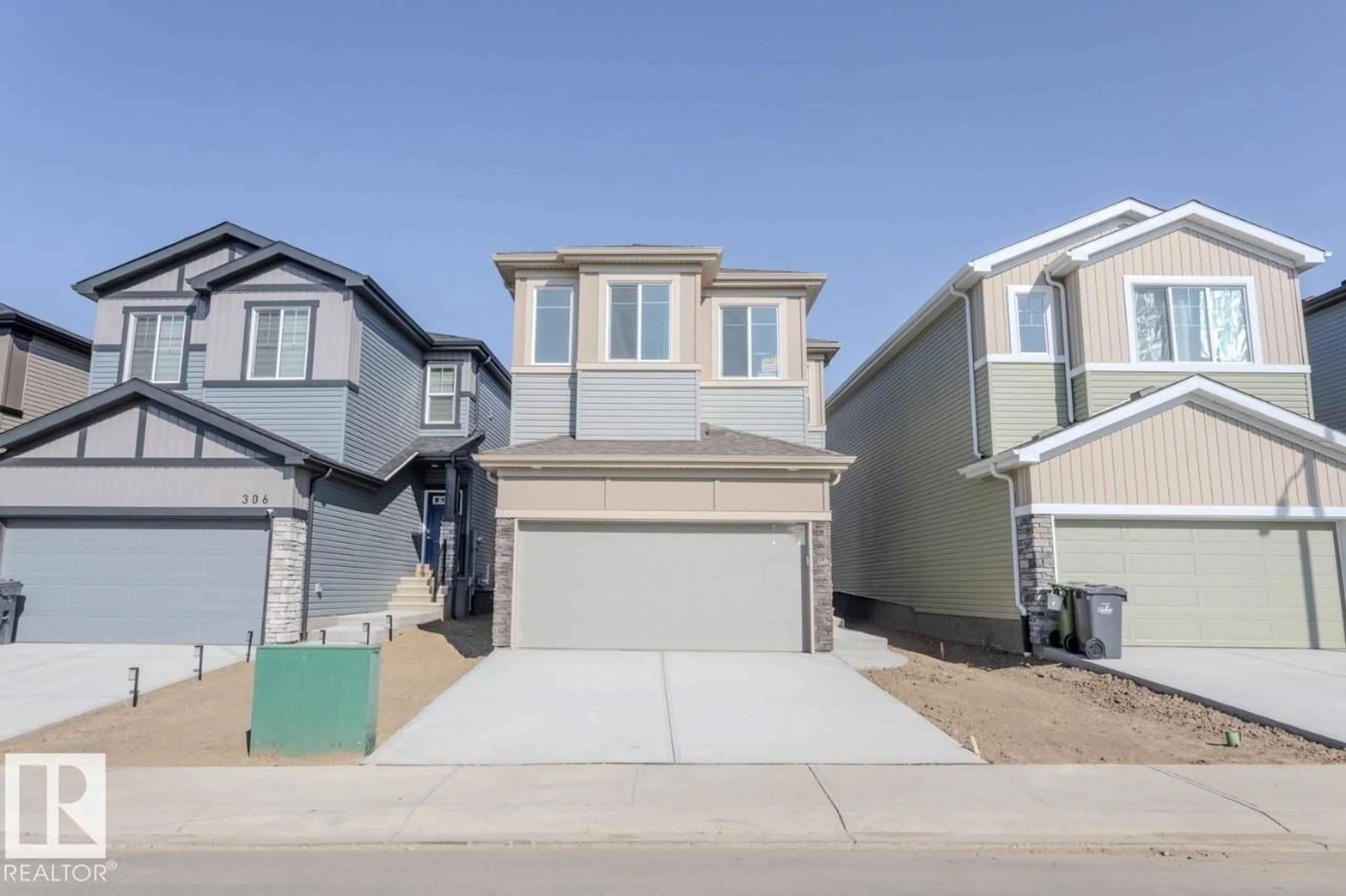 Home with vinyl exterior material, street for 304 JUNIPER CV, Leduc Alberta T9E1S7
